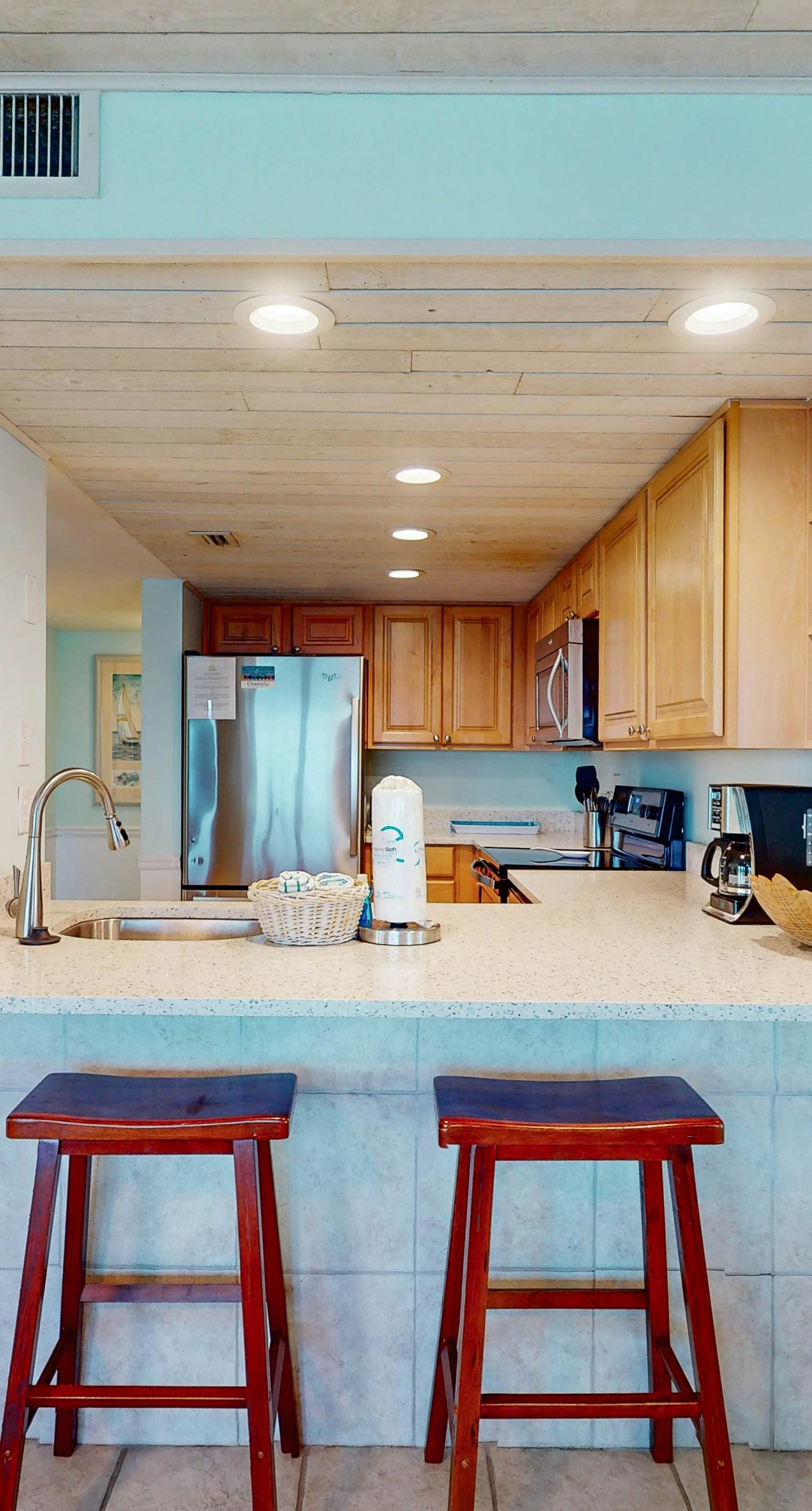 Oceanfront condo with shared pool, resort amenities, and private washer/dryer