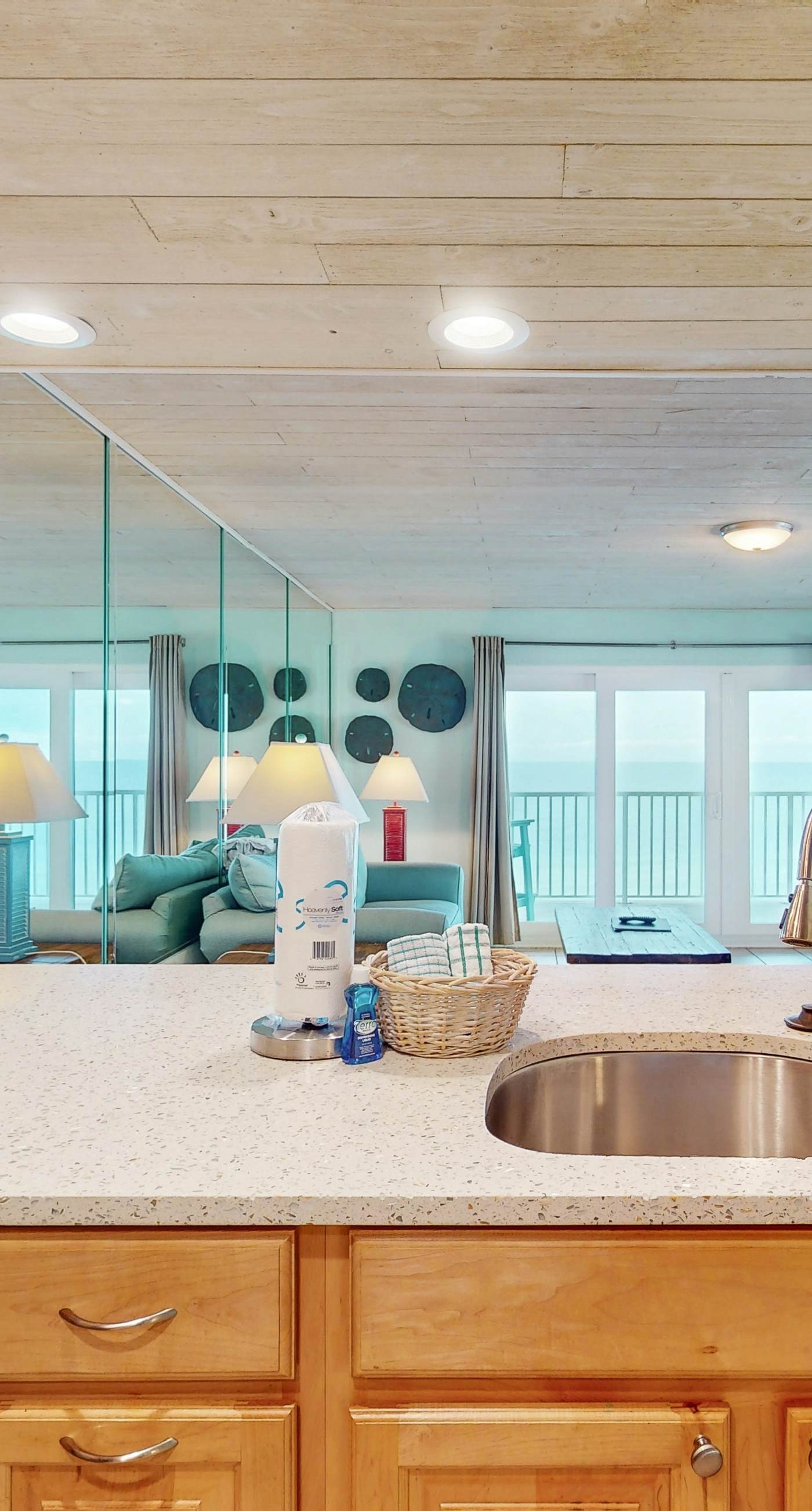 Oceanfront condo with shared pool, resort amenities, and private washer/dryer