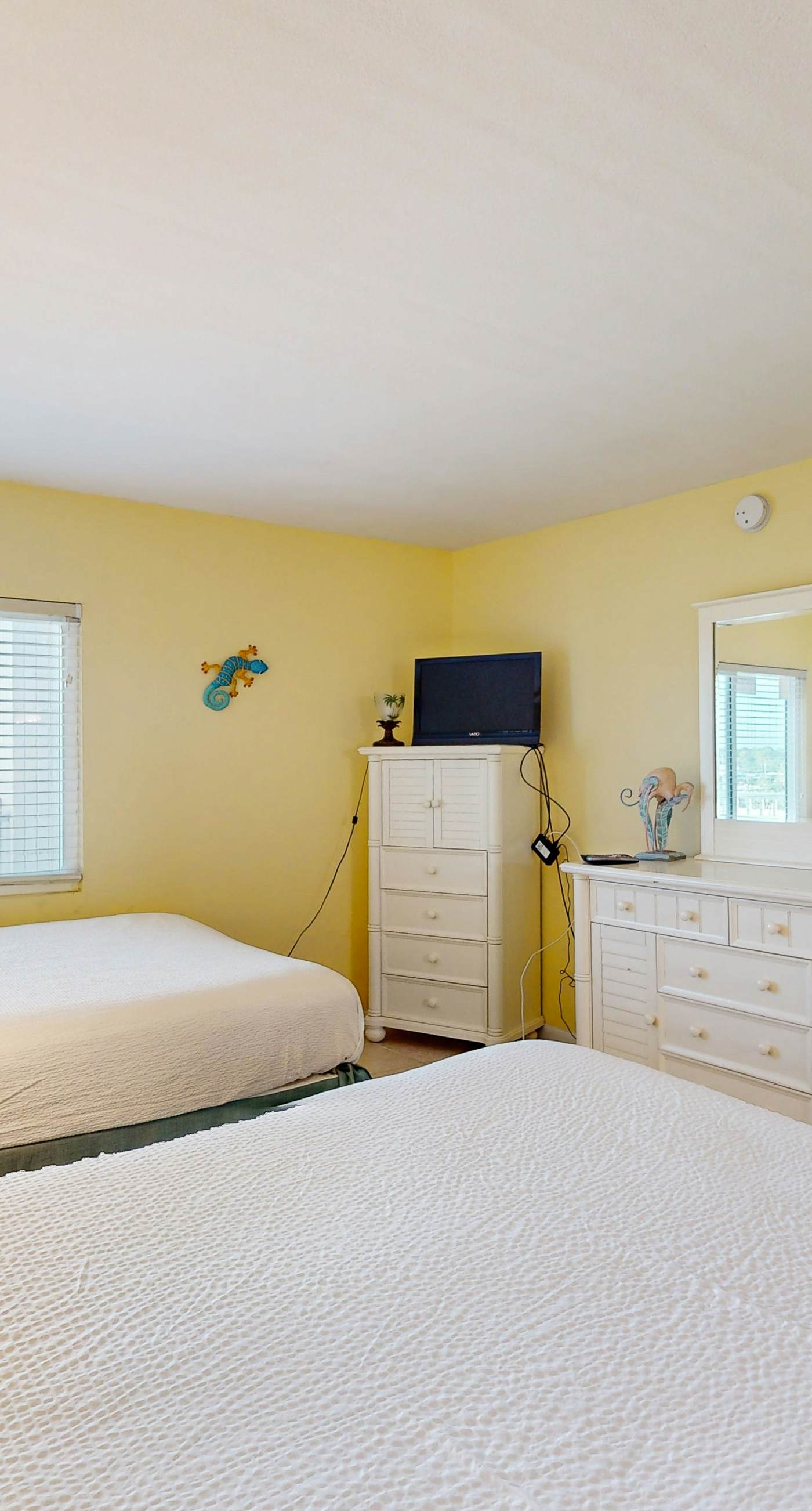 Oceanfront condo with shared pool, resort amenities, and private washer/dryer