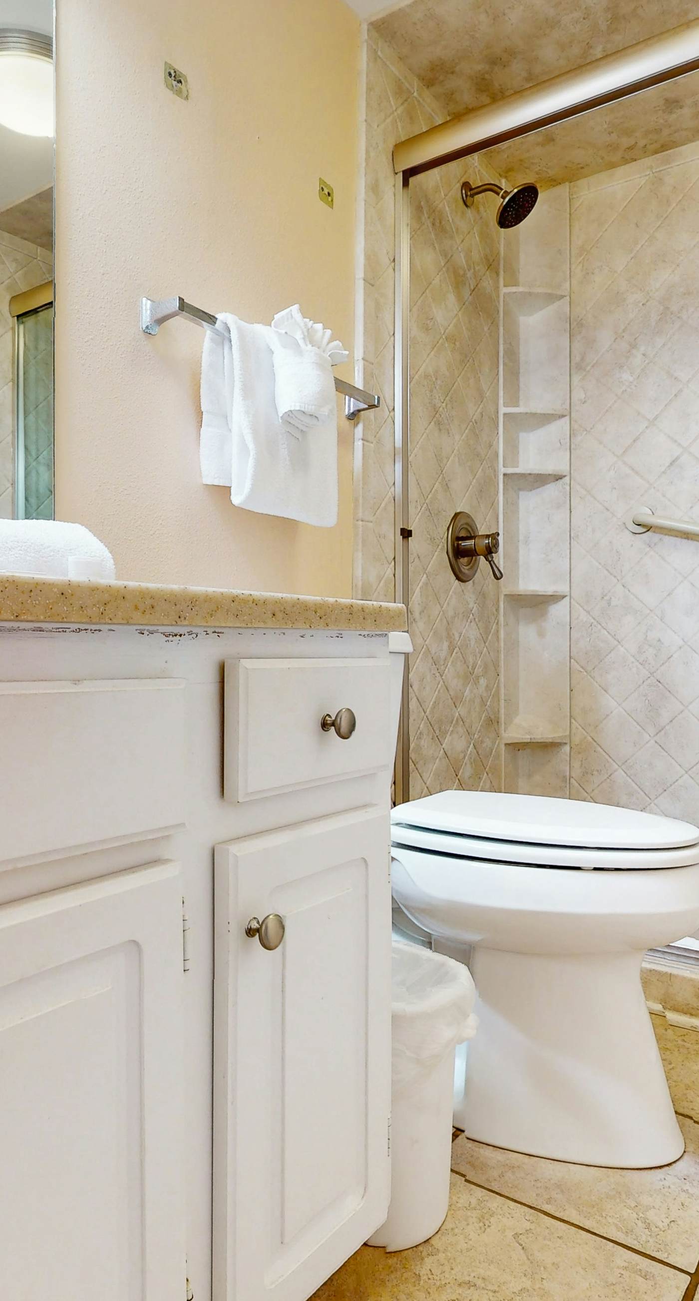 Oceanfront condo with shared pool, resort amenities, and private washer/dryer