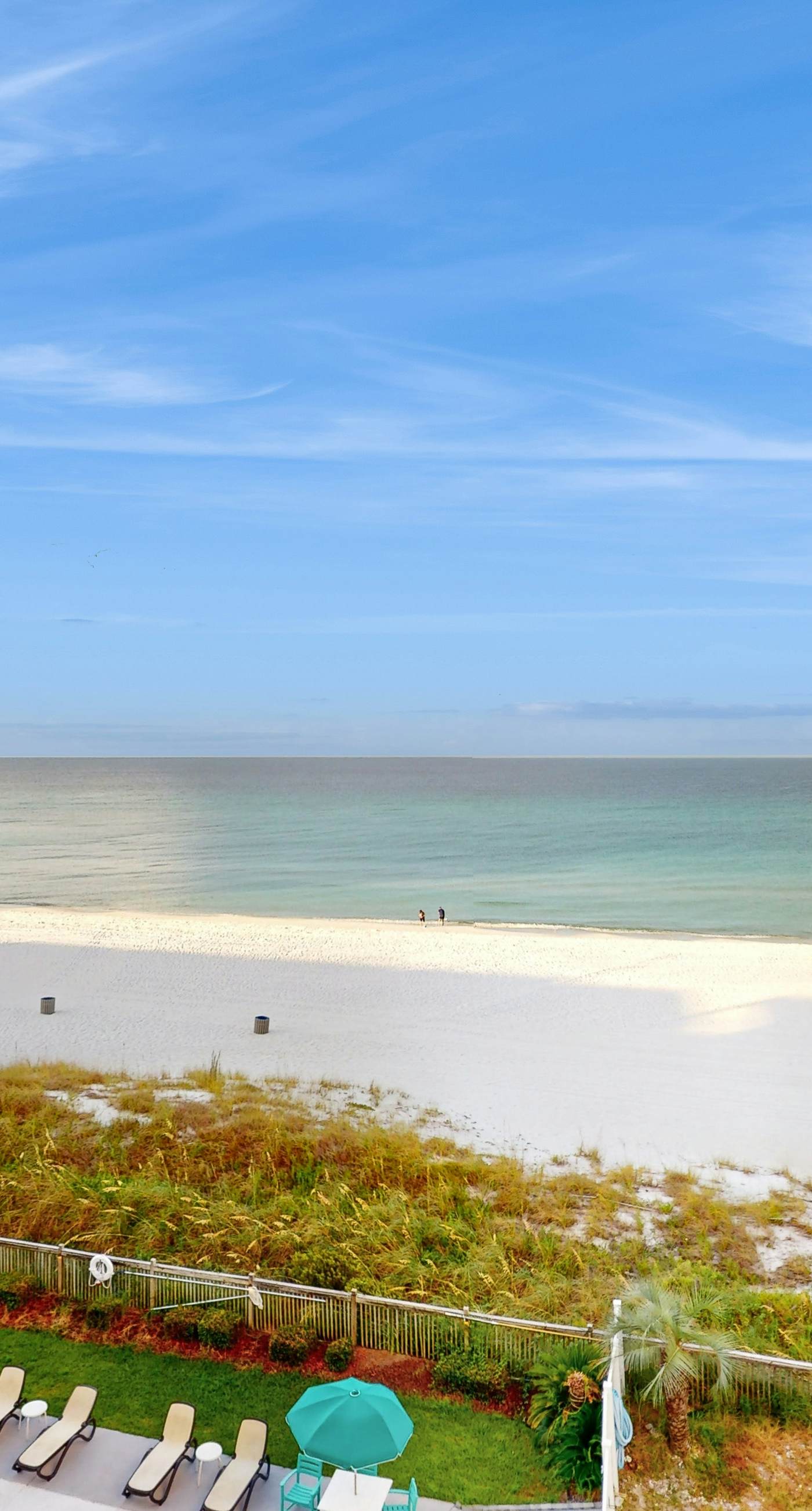 Oceanfront condo with shared pool, resort amenities, and private washer/dryer