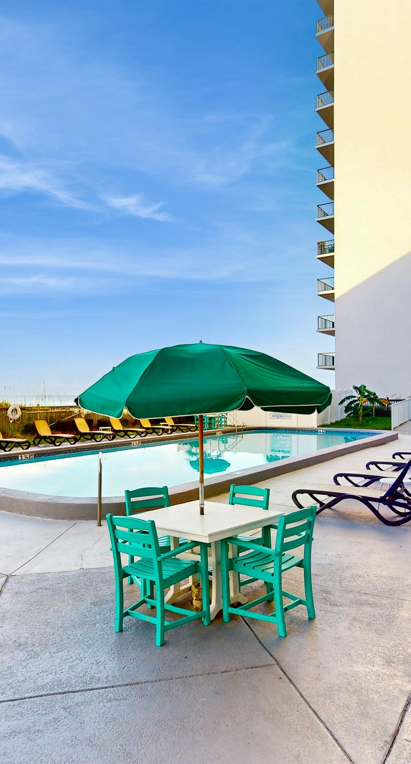 Oceanfront condo with shared pool, resort amenities, and private washer/dryer