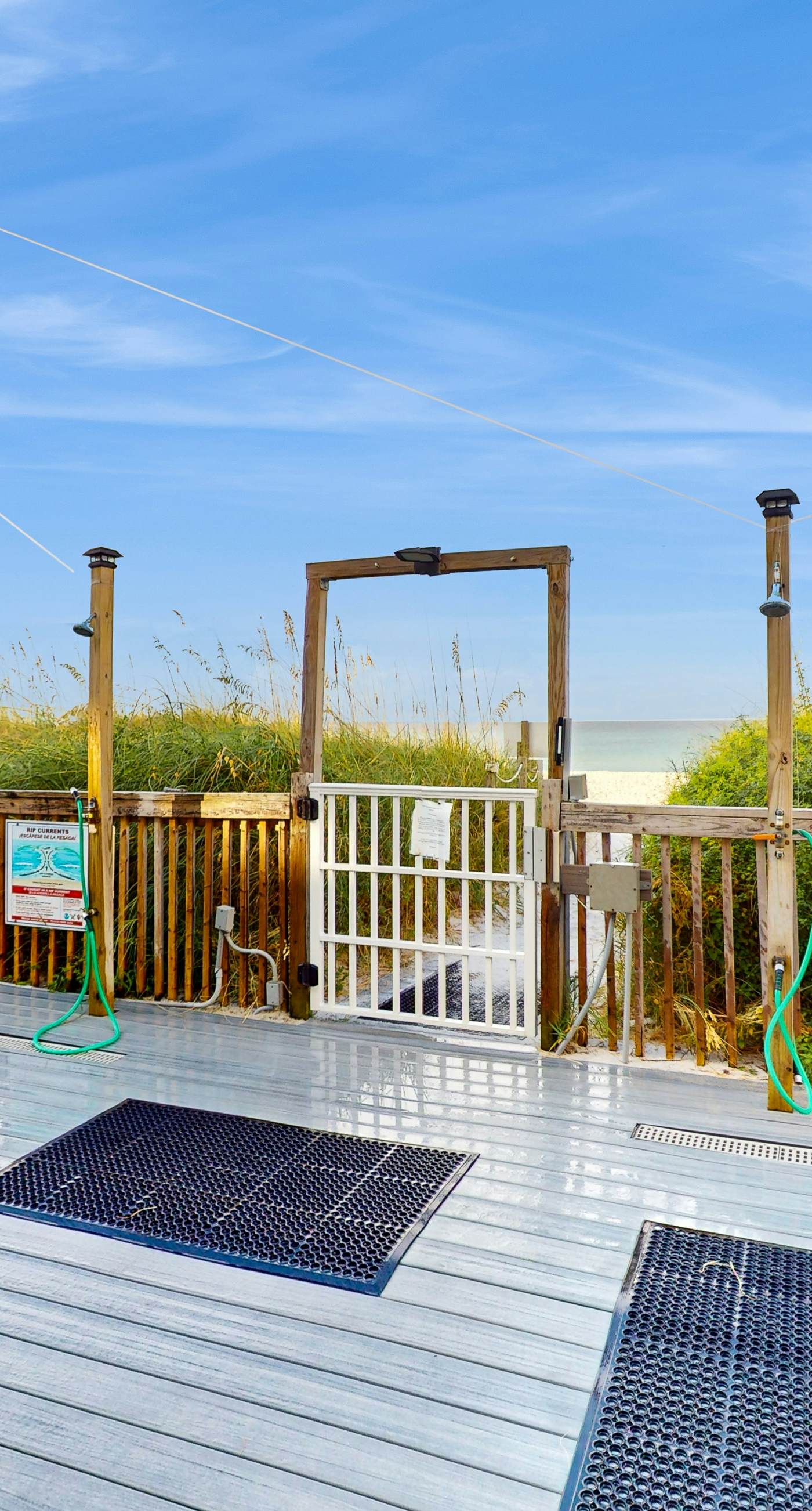 Oceanfront condo with shared pool, resort amenities, and private washer/dryer