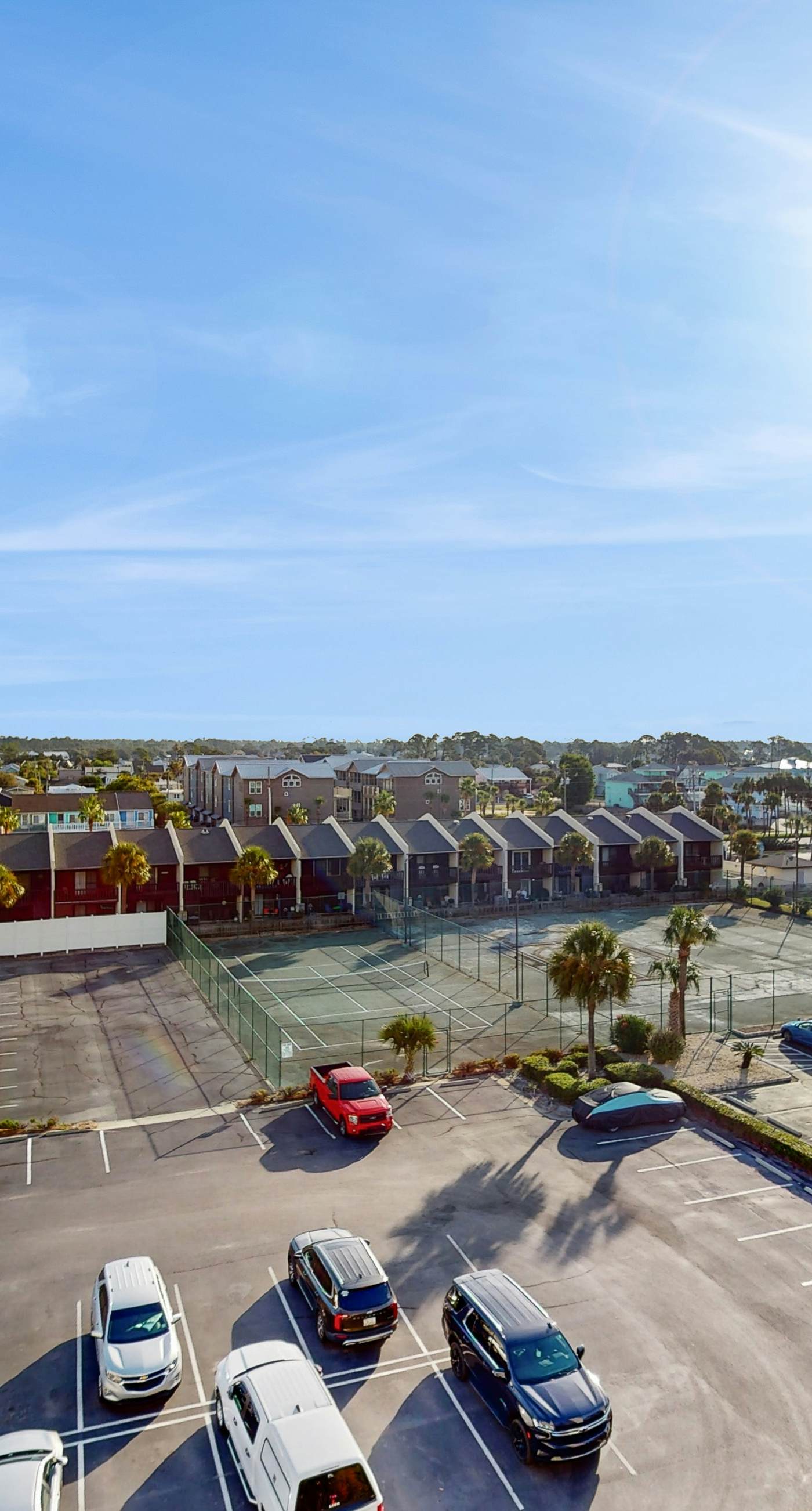 Oceanfront condo with shared pool, resort amenities, and private washer/dryer