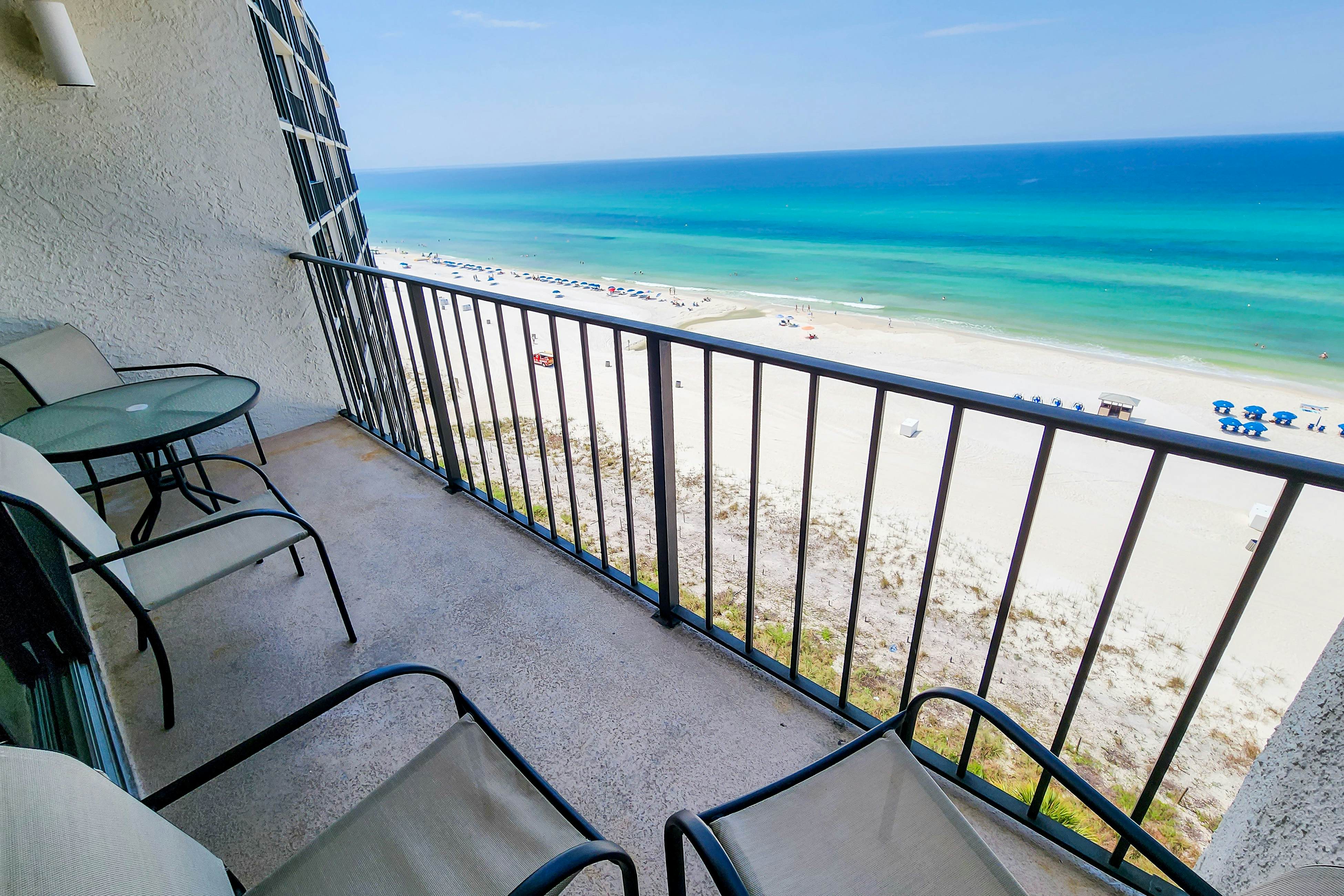 Exquisite beachfront condo with pool, hot tub, balcony, central AC, & W/D