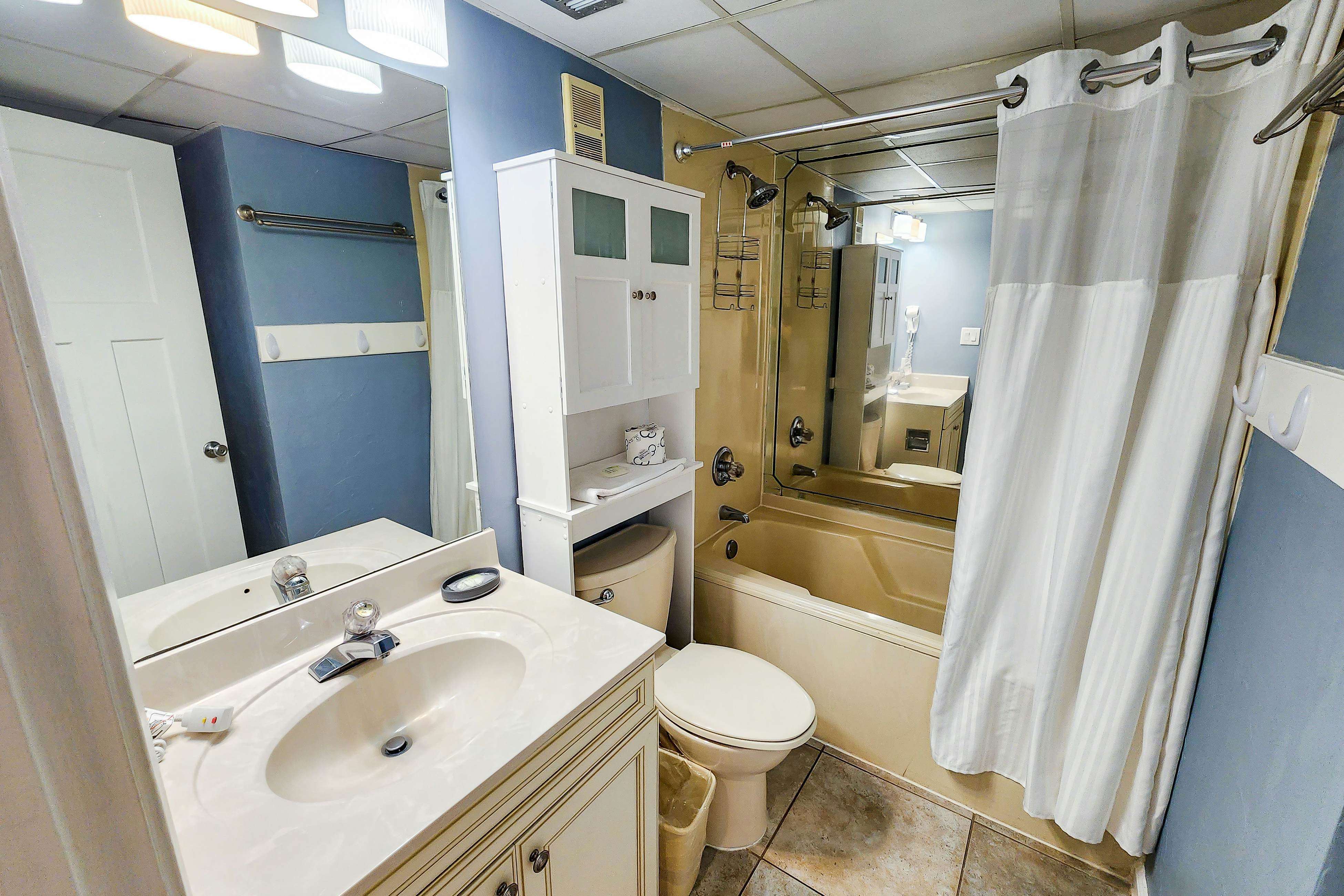 Exquisite beachfront condo with pool, hot tub, balcony, central AC, & W/D