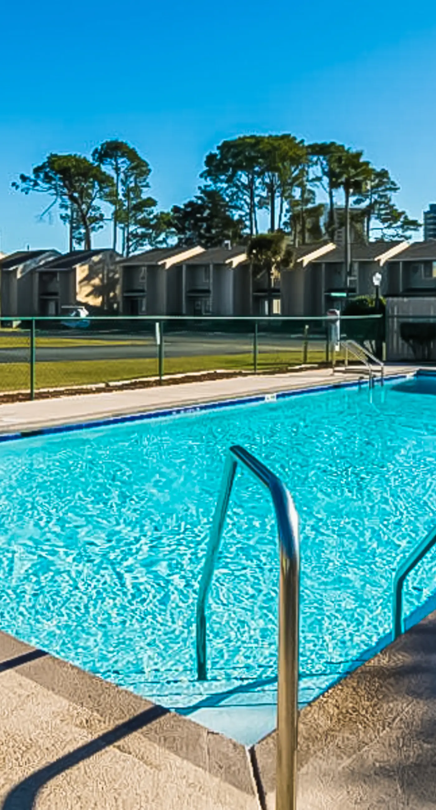 Gated resort townhome with pools, sports courts, & easy beach access