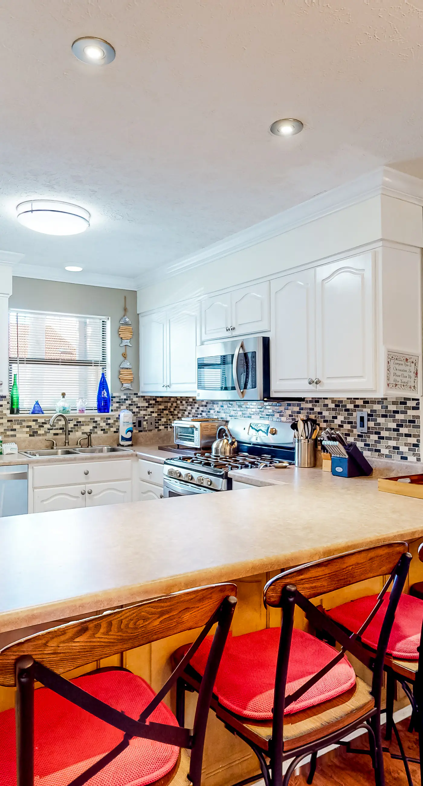 Gated resort townhome with pools, sports courts, & easy beach access