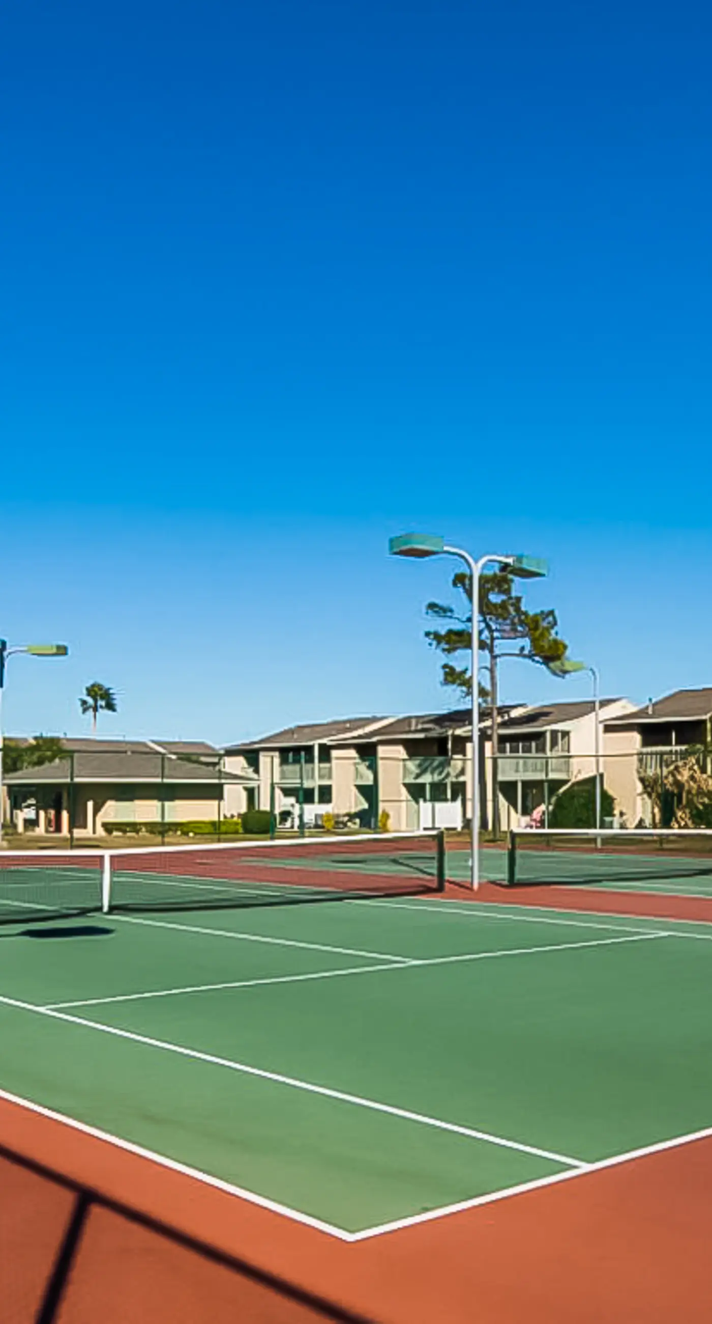 Gated resort townhome with pools, sports courts, & easy beach access