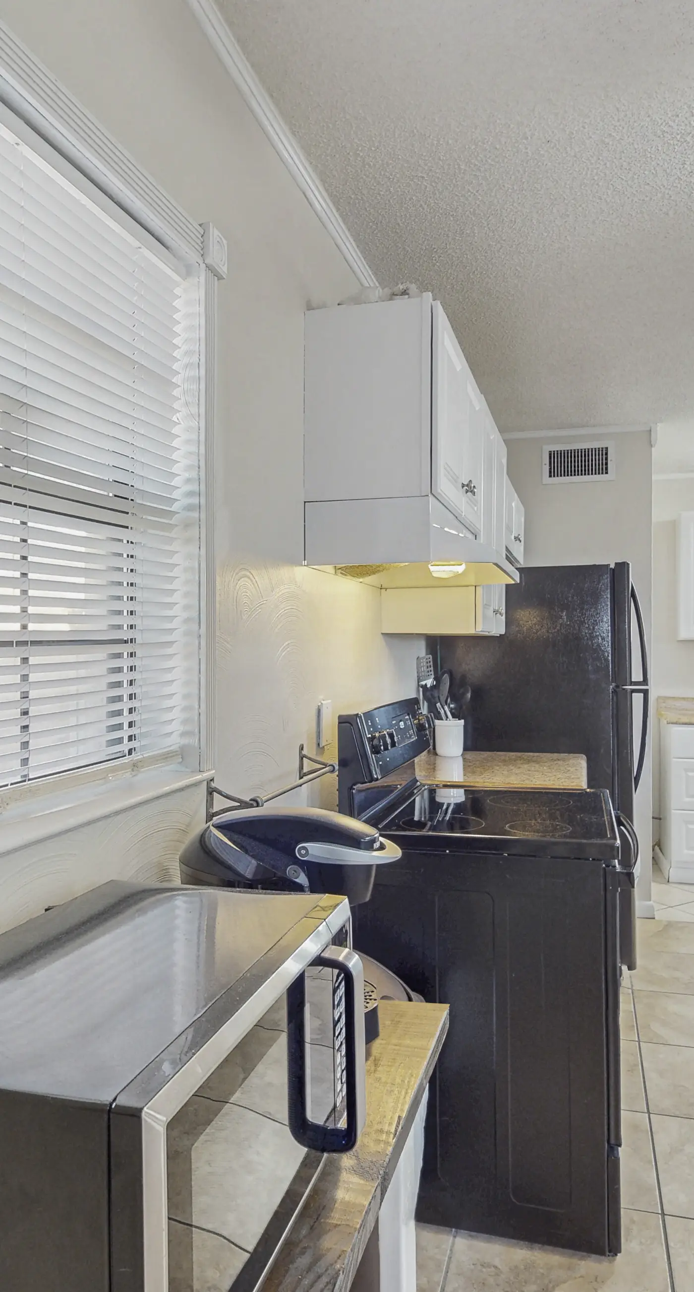 New listing! Dog-friendly beach escape w/ a full kitchen & furnished back patio