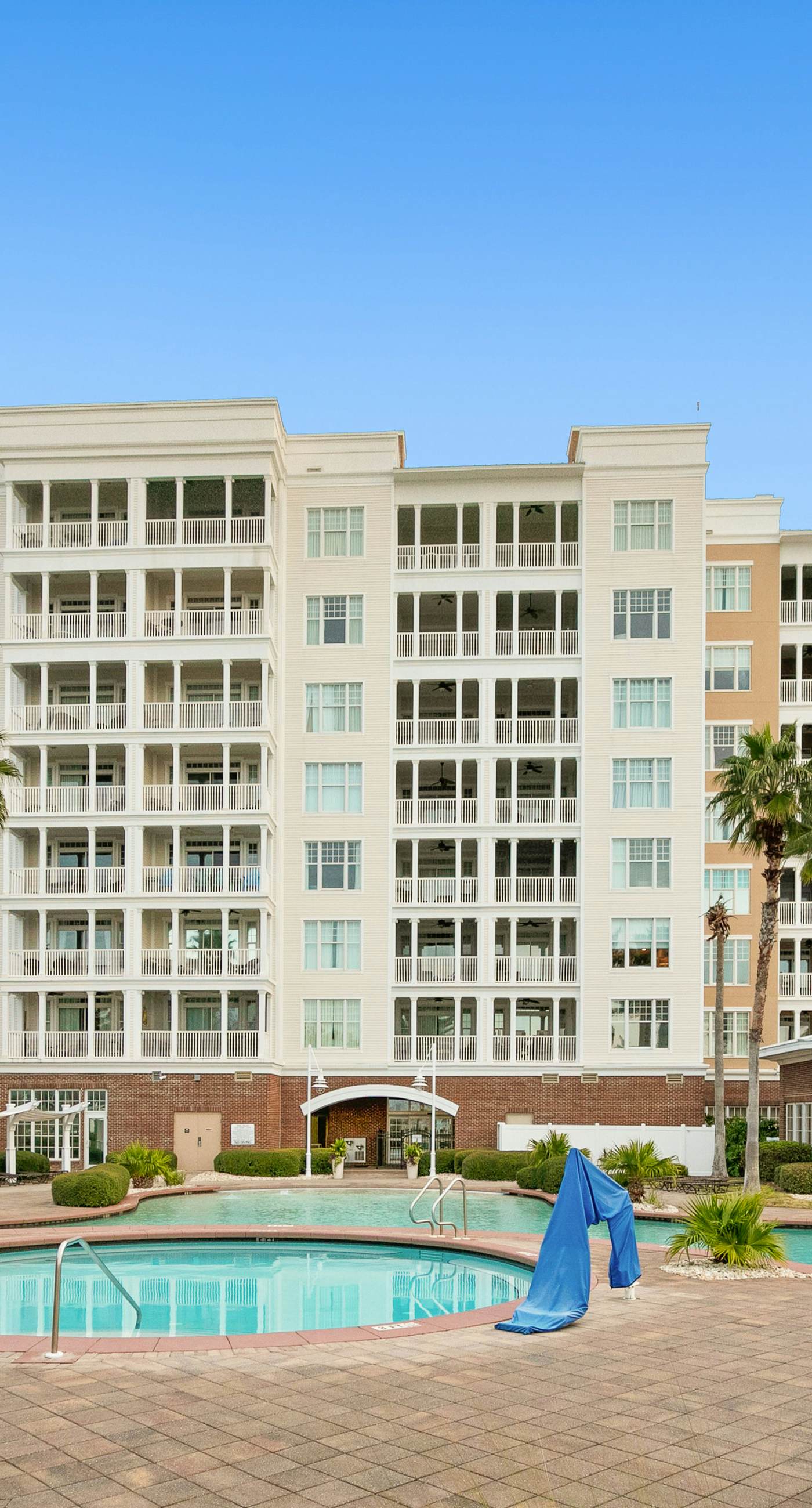 3rd-floor beach & pool-view condo with outdoor pool, hot tub, grills, balcony