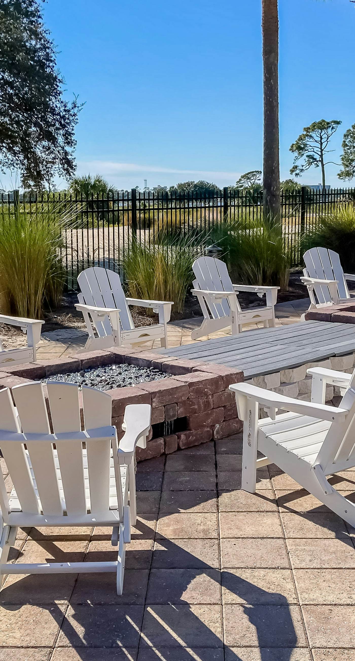 3rd-floor beach & pool-view condo with outdoor pool, hot tub, grills, balcony