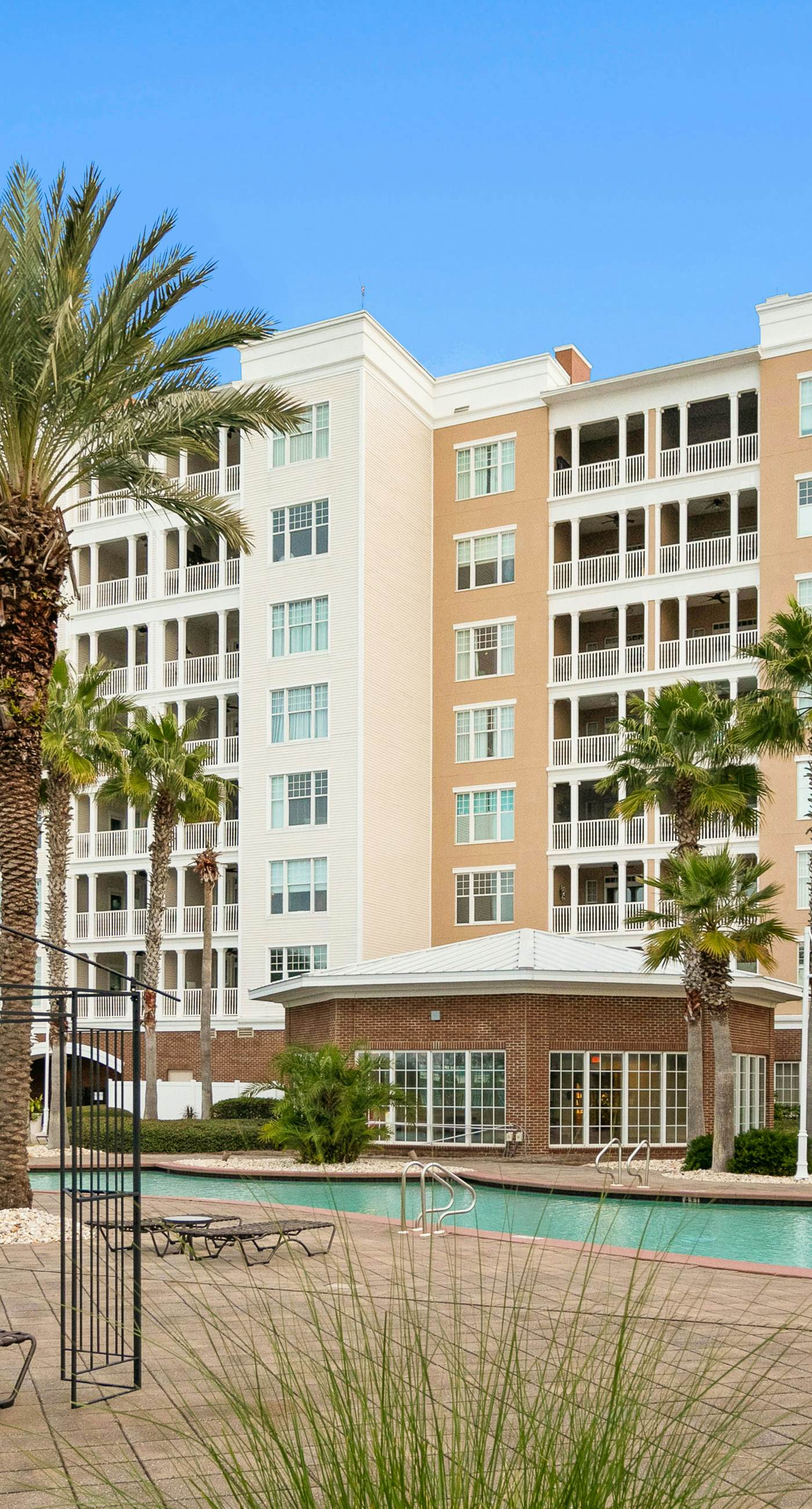 3rd-floor beach & pool-view condo with outdoor pool, hot tub, grills, balcony