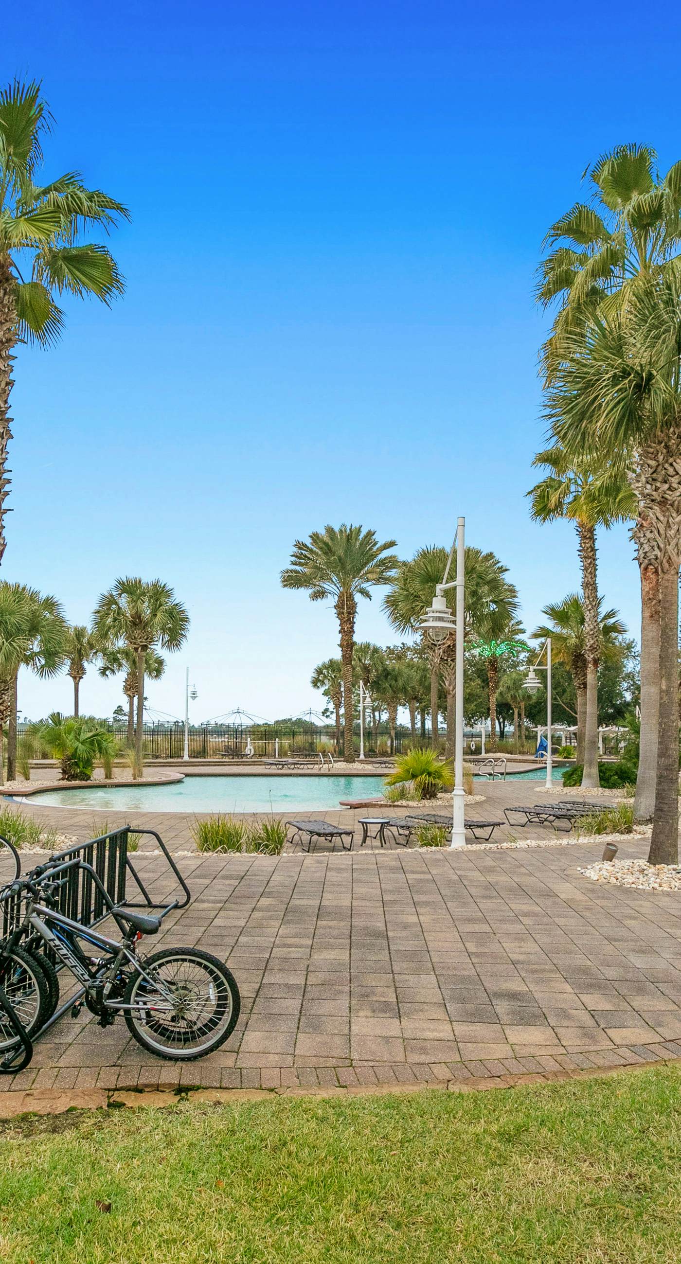 3rd-floor beach & pool-view condo with outdoor pool, hot tub, grills, balcony