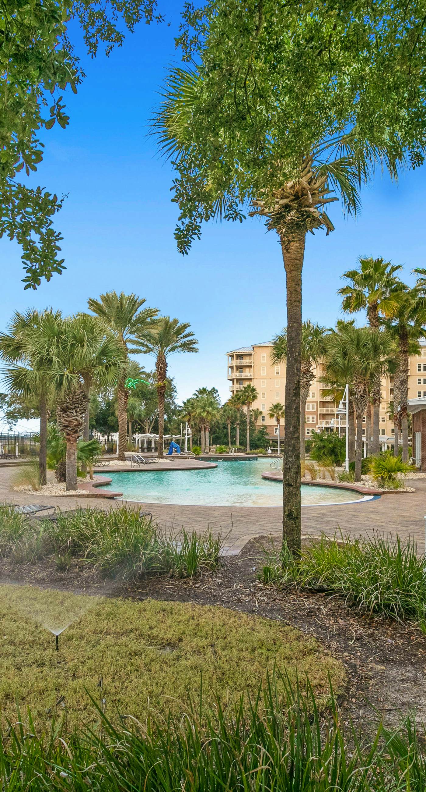 3rd-floor beach & pool-view condo with outdoor pool, hot tub, grills, balcony