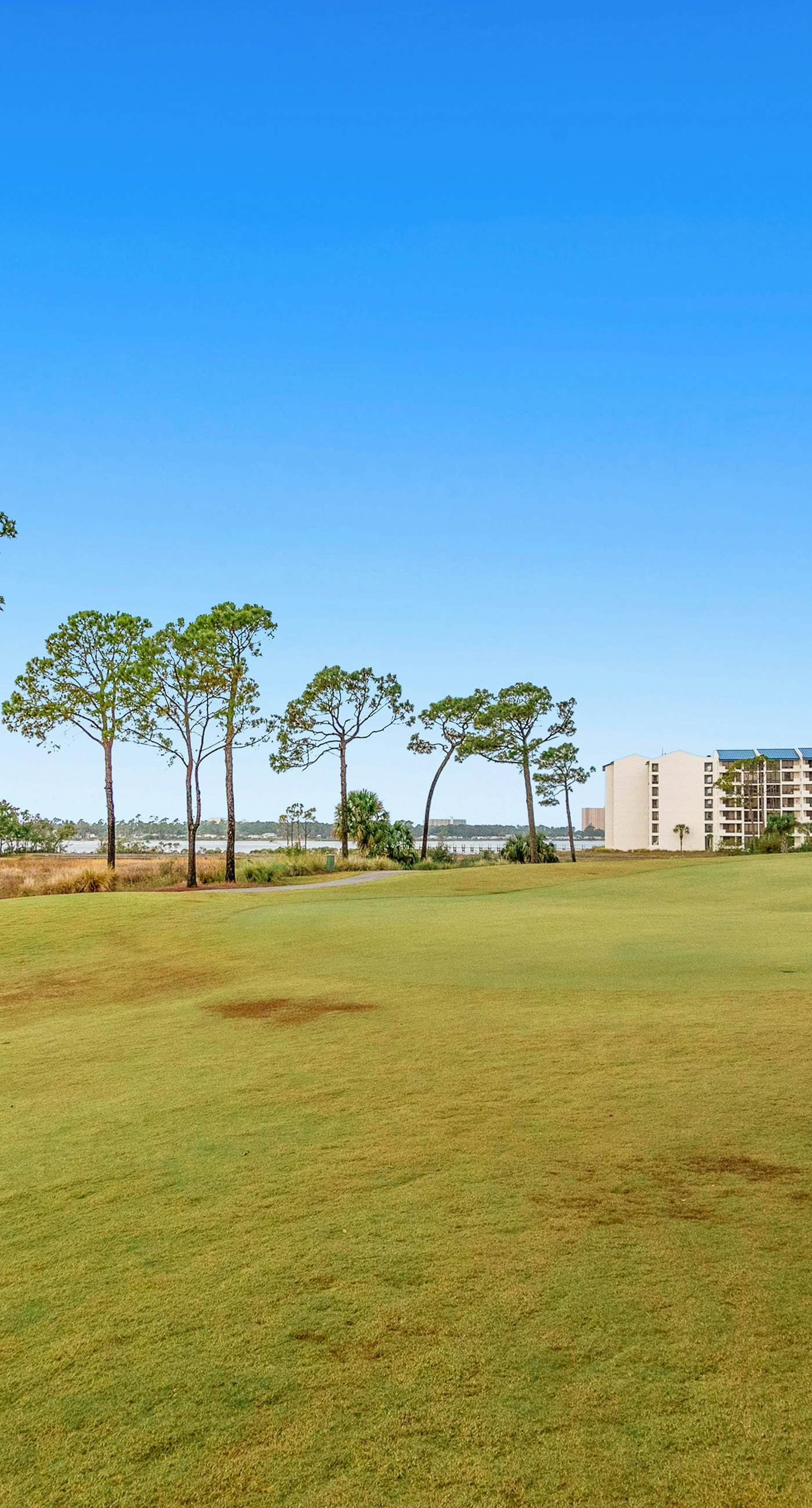 3rd-floor beach & pool-view condo with outdoor pool, hot tub, grills, balcony