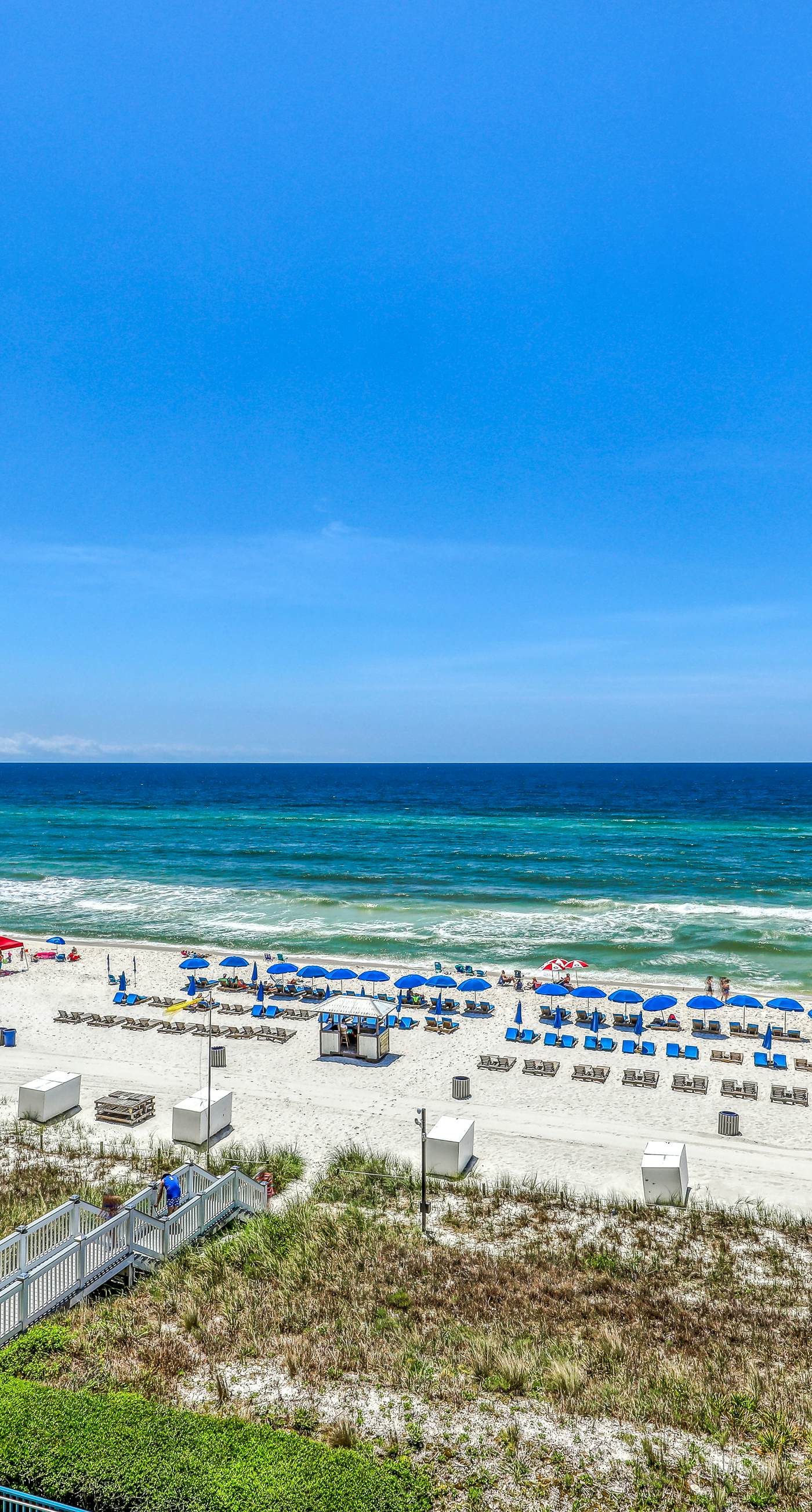 Gulf-front condo with balcony, beach access, hot tub, pool & gym