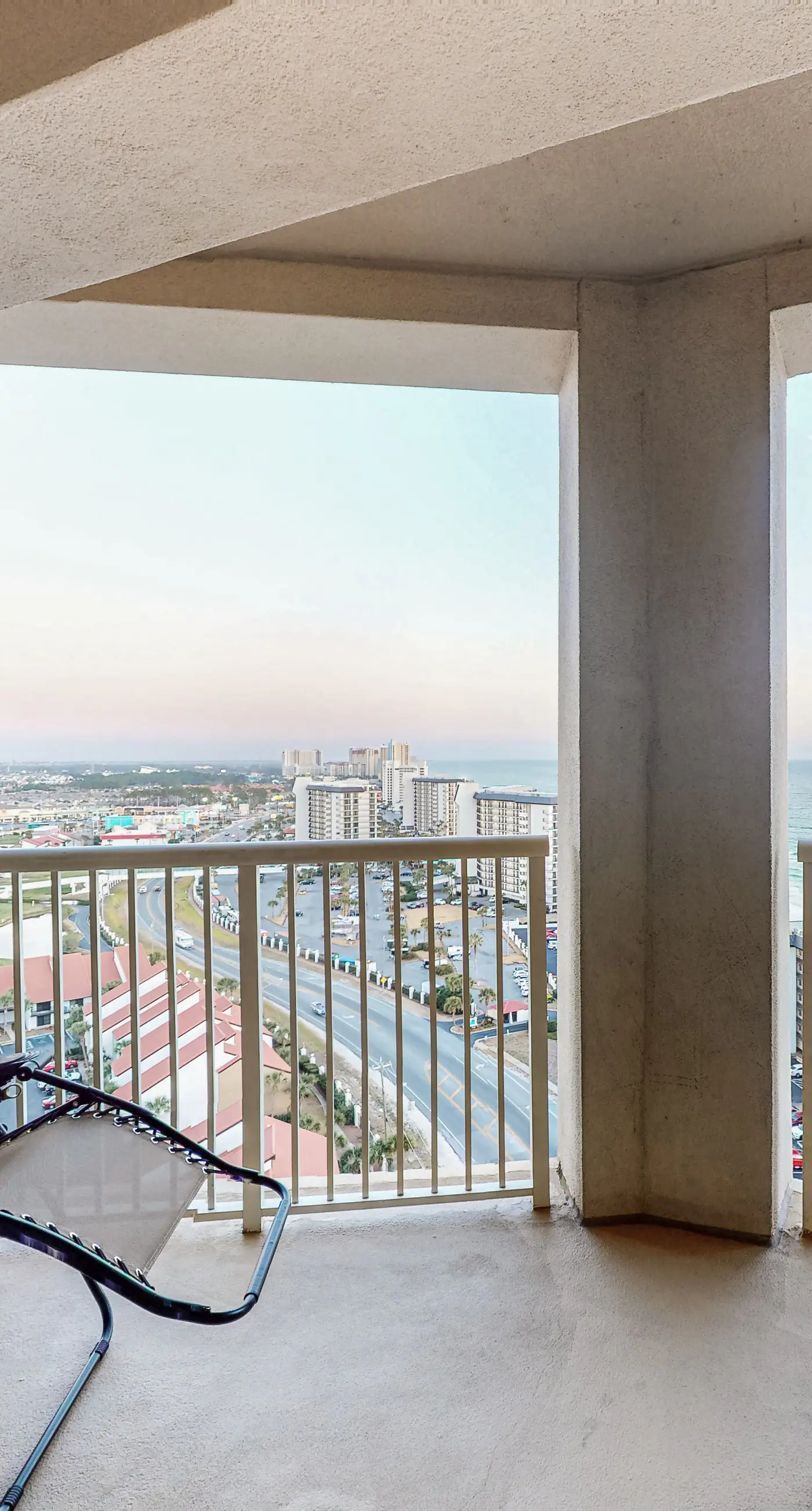 Water-view condo with central AC, pool & private beach access
