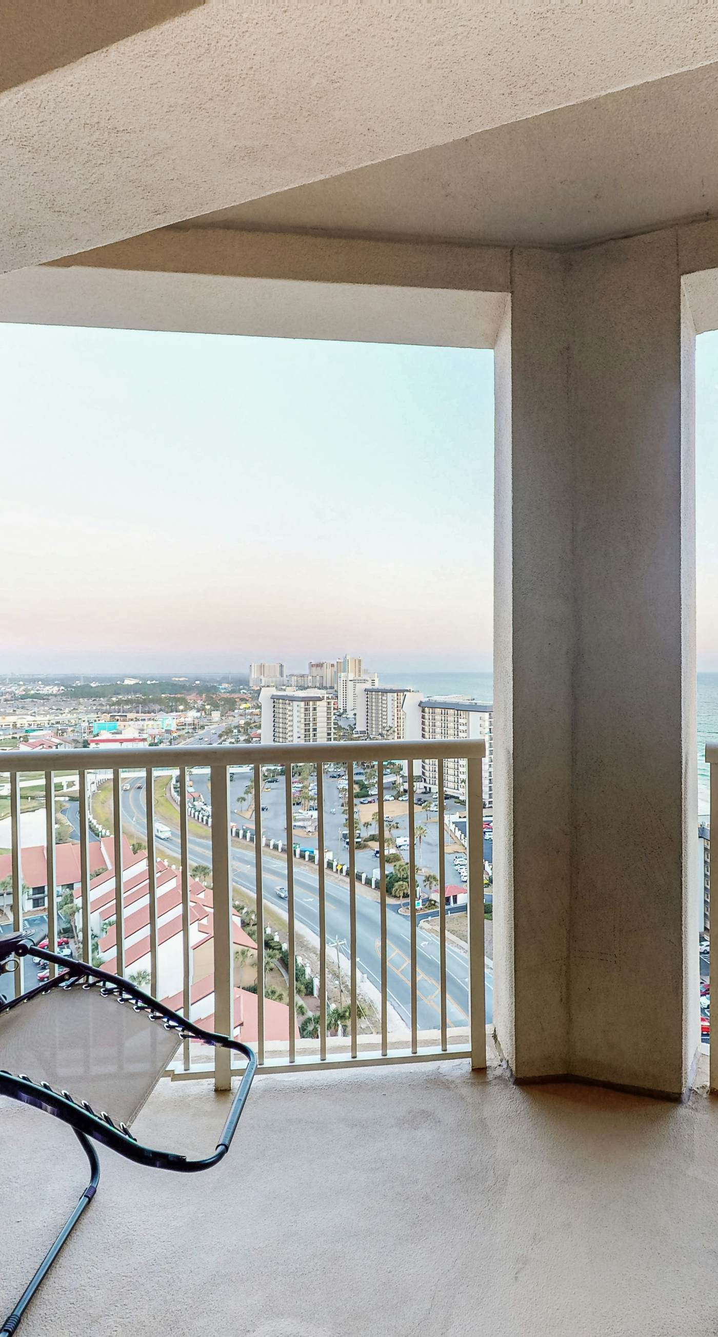 Water-view condo with central AC, pool & private beach access