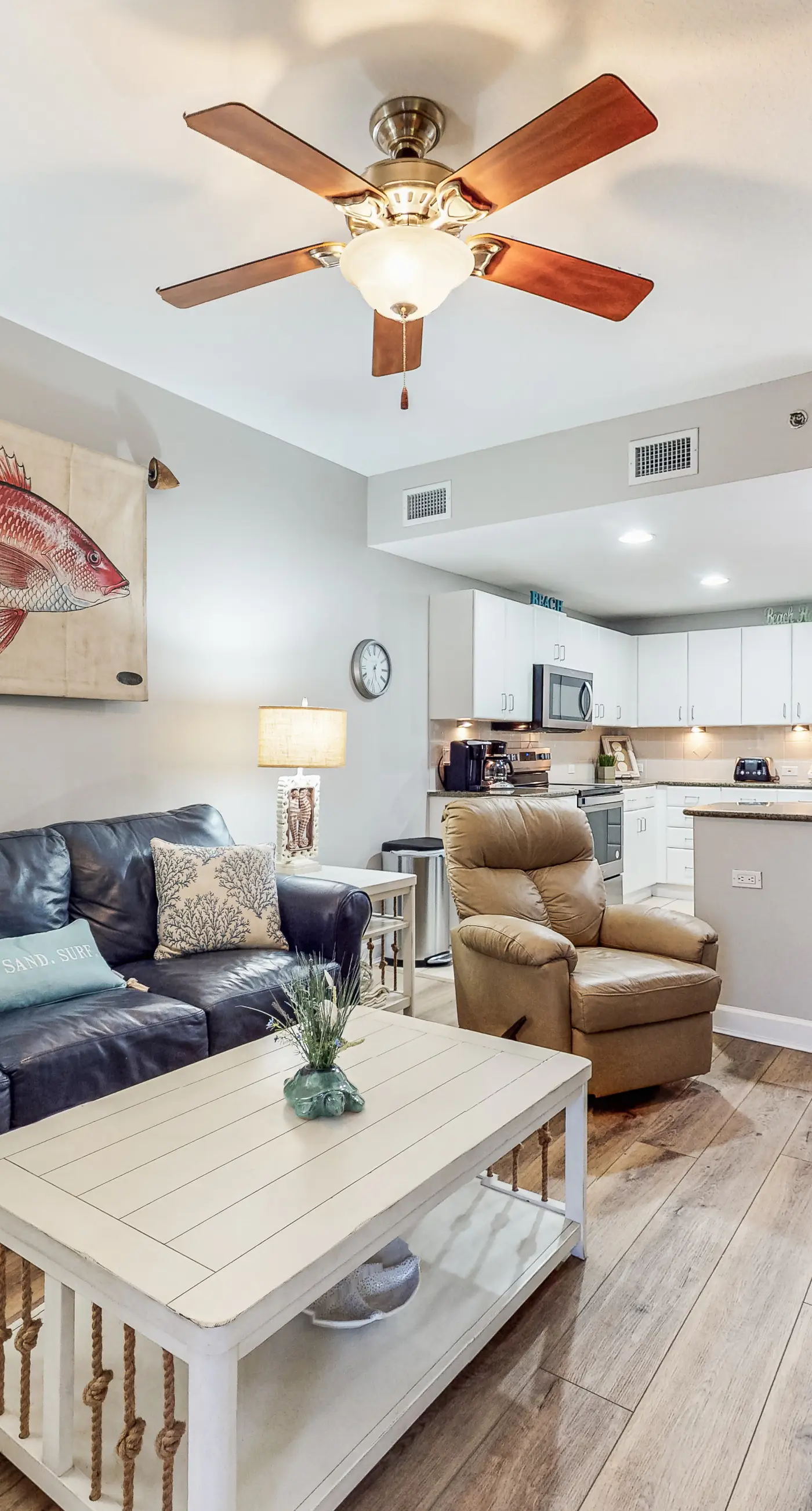 Water-view condo with central AC, pool & private beach access