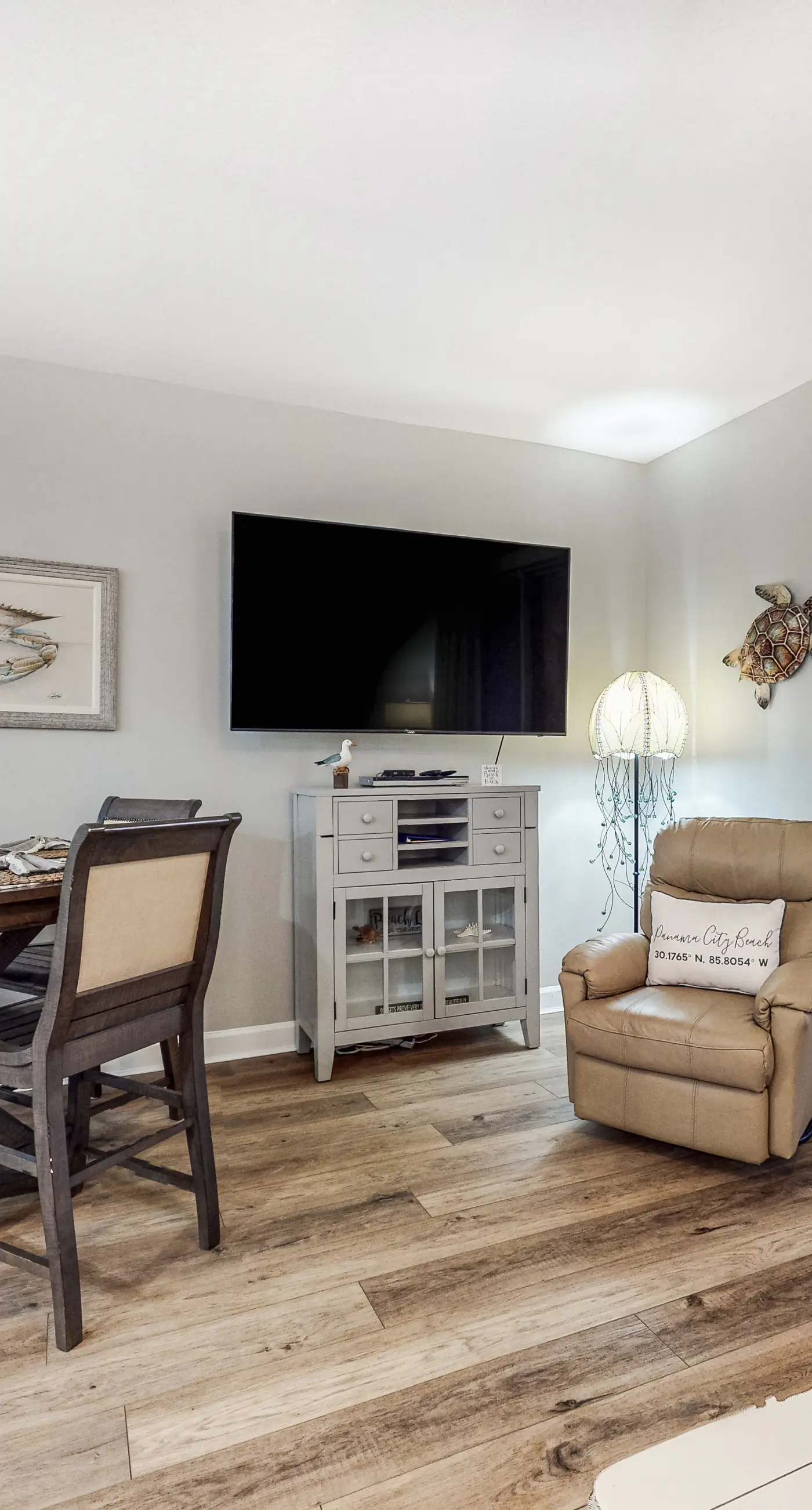 Water-view condo with central AC, pool & private beach access