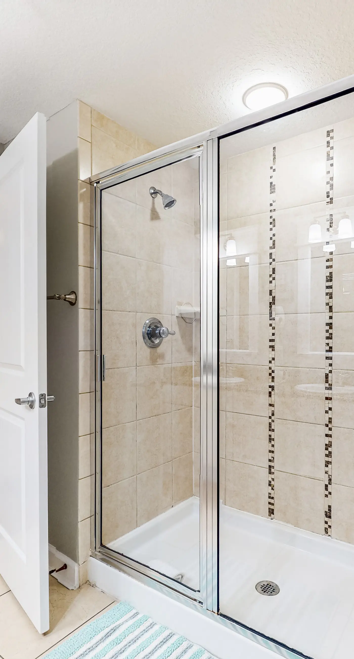 Water-view condo with central AC, pool & private beach access