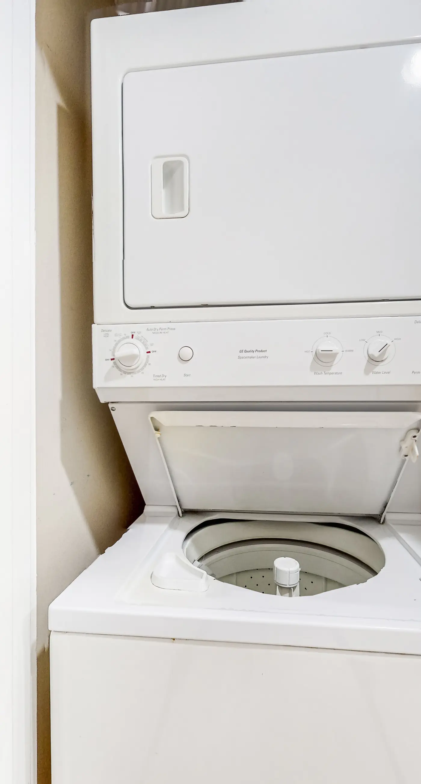 Water-view condo with central AC, pool & private beach access