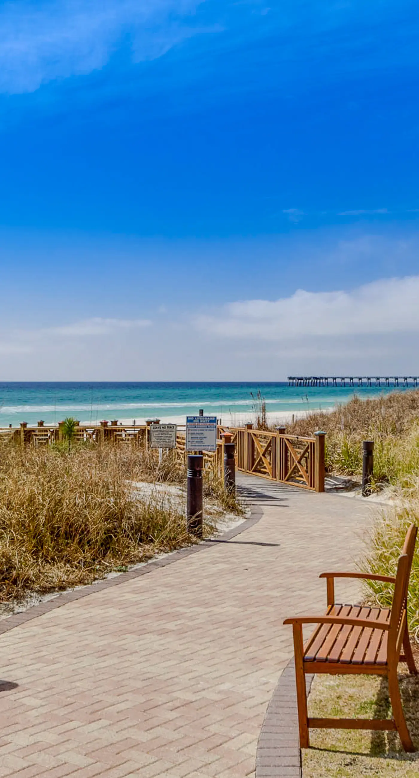 Water-view condo with central AC, pool & private beach access