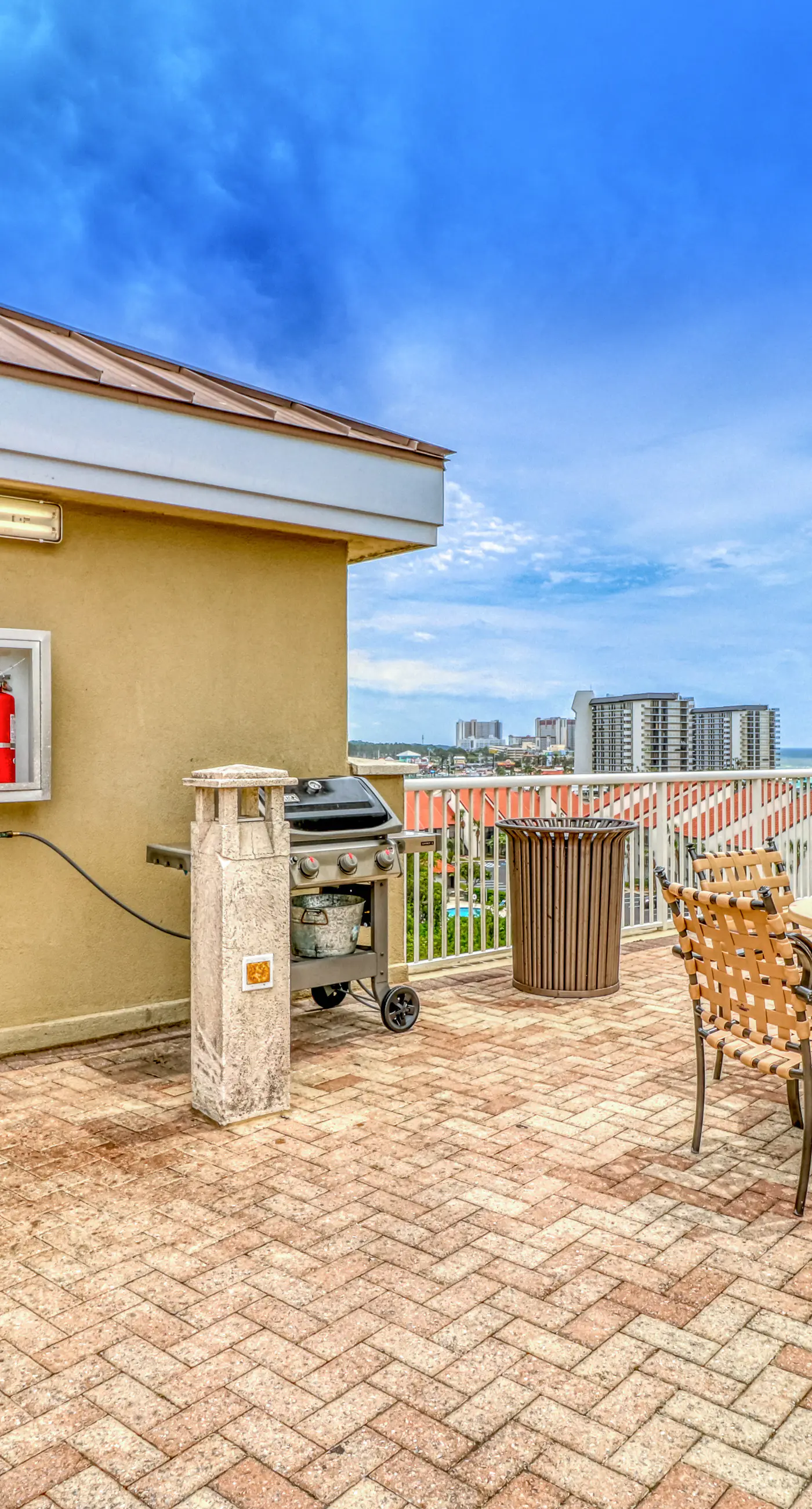 Fifth-floor beachfront condo with furnished balcony, pools, hot tub & grills