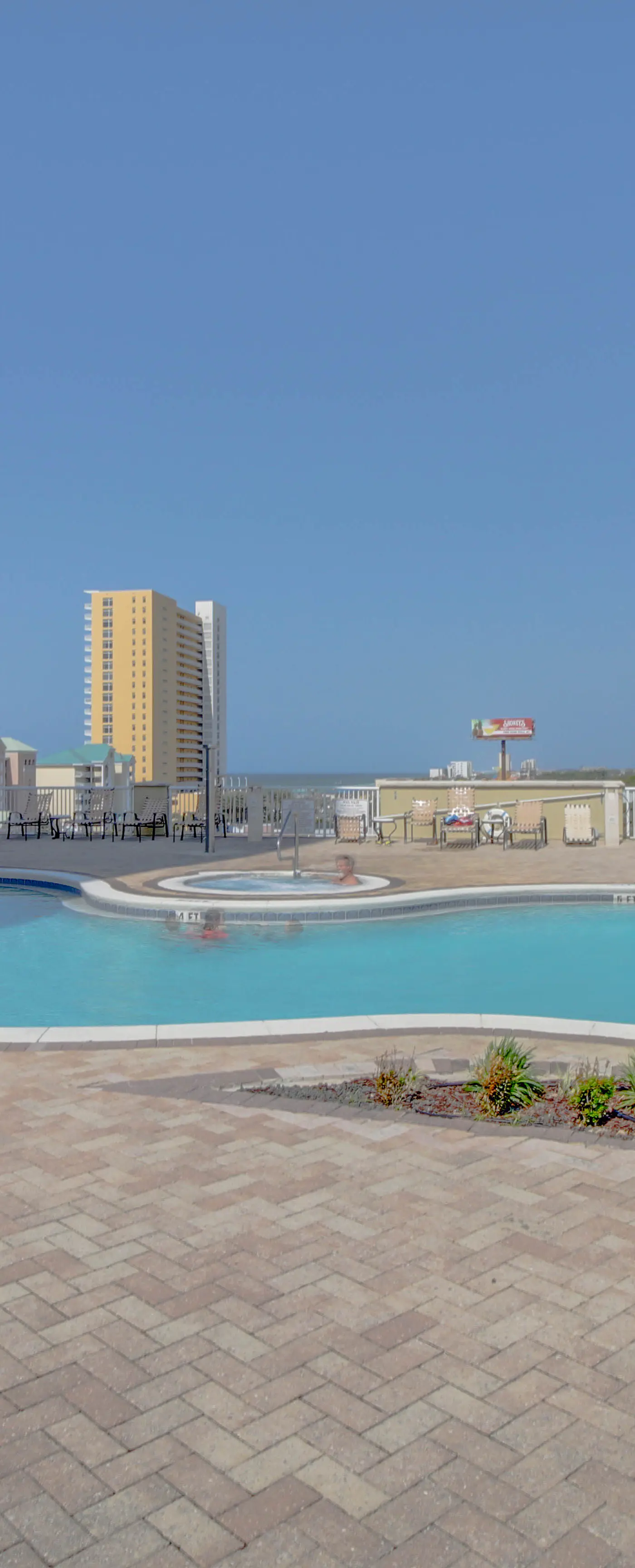 Lovely coastal condo with water views, pool, hot tub, private balcony & WD