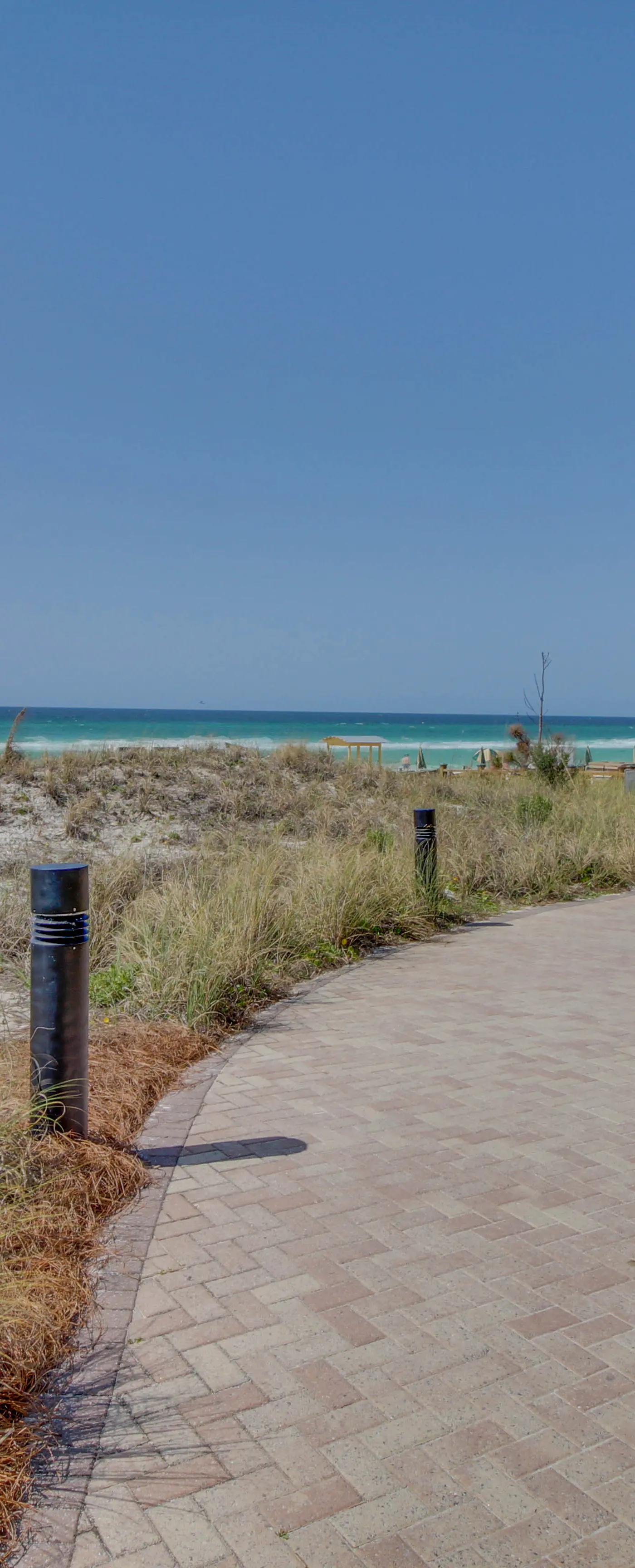Lovely coastal condo with water views, pool, hot tub, private balcony & WD