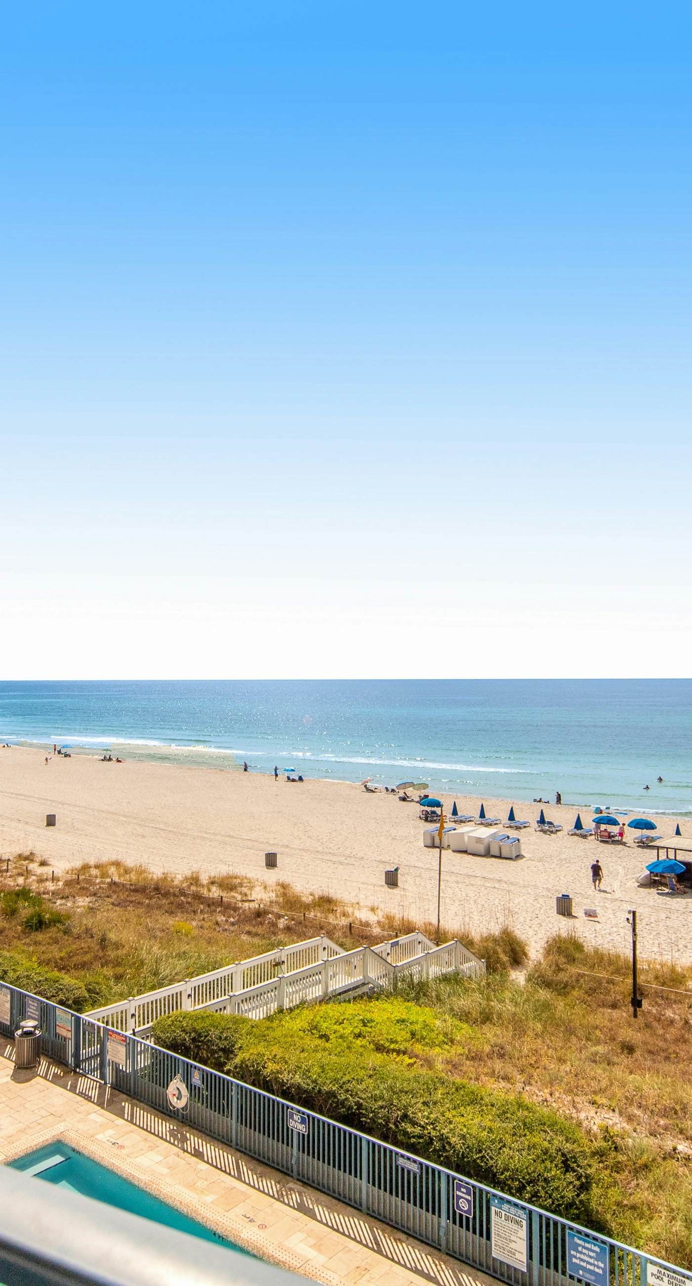 Gulf-front condo with seasonal beach service, pool, hot tub & gym