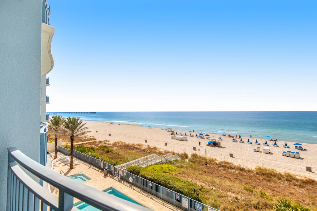 Gulf-front condo with seasonal beach service, pool, hot tub & gym