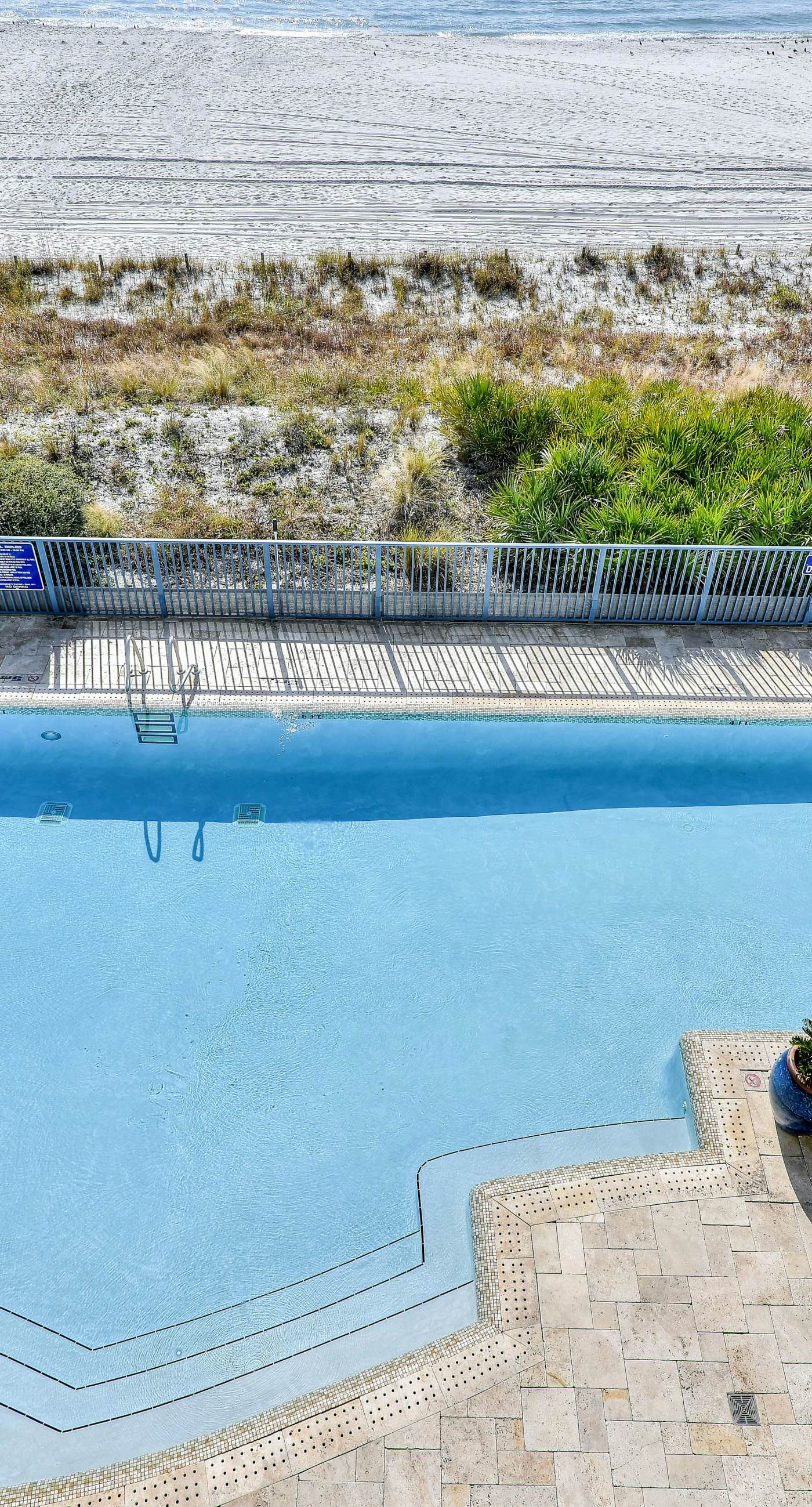 Gulf-front condo with seasonal beach service, pool, hot tub & gym