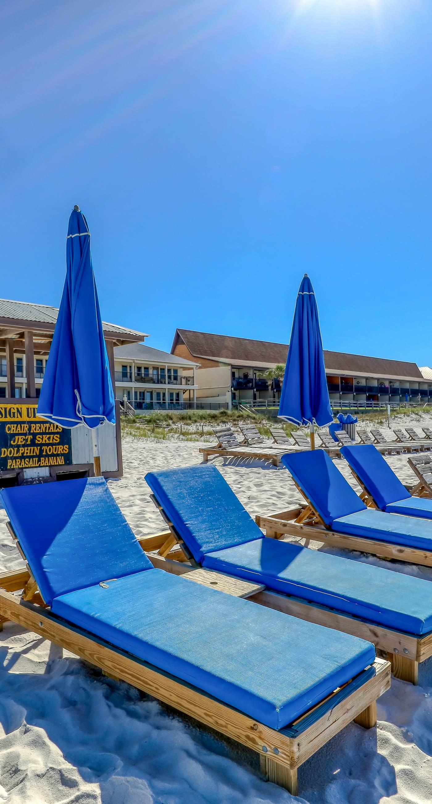 Gulf-front condo with seasonal beach service, pool, hot tub & gym