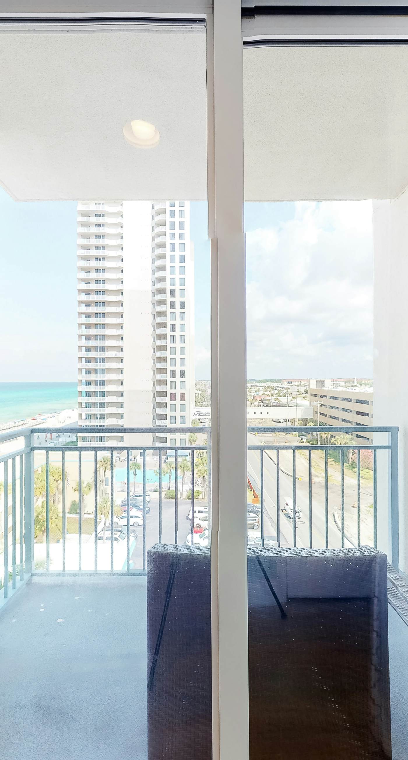 7th-floor resort studio with partial Gulf views, outdoor pool, gym & hot tub