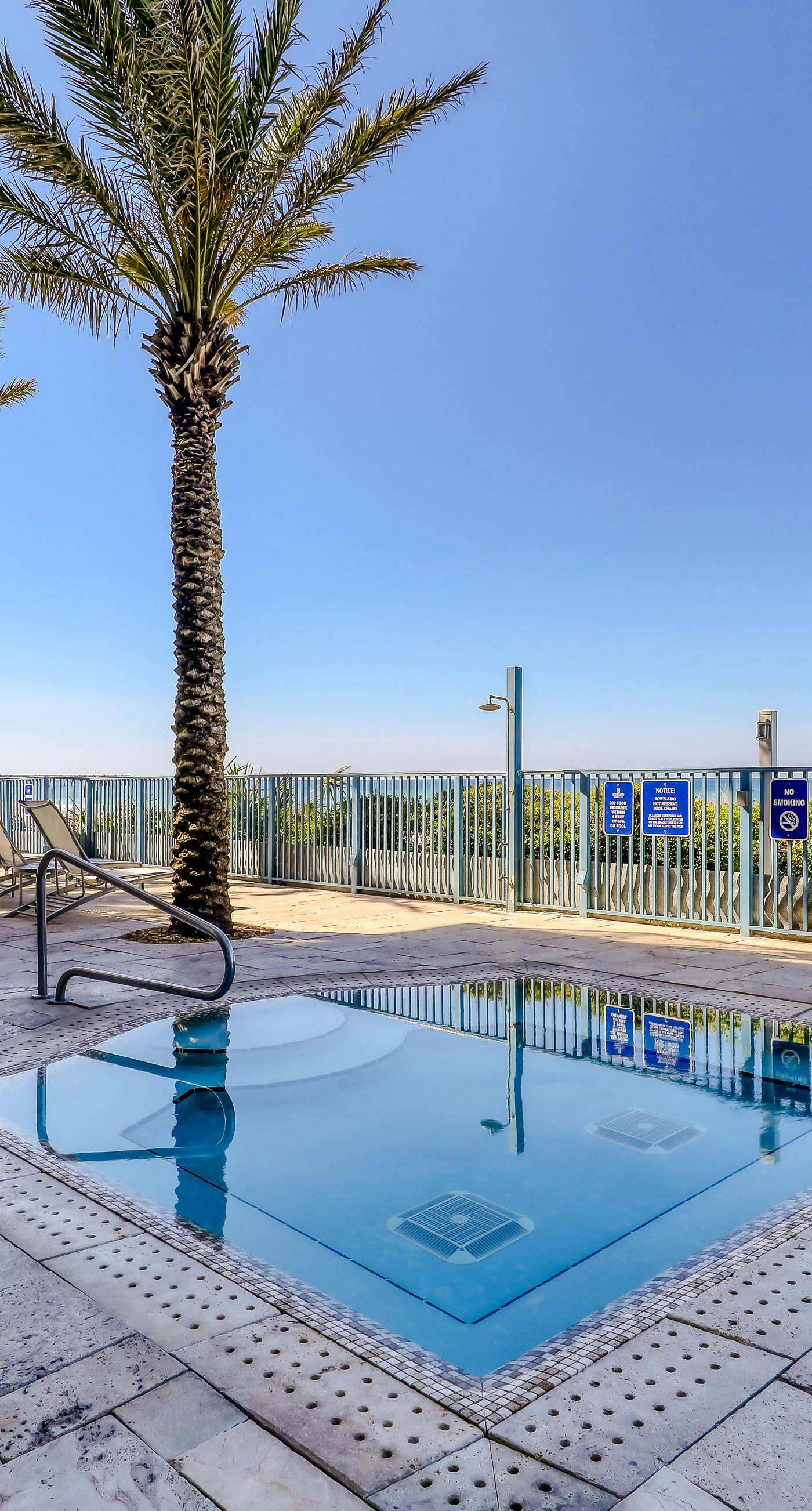 7th-floor resort studio with partial Gulf views, outdoor pool, gym & hot tub