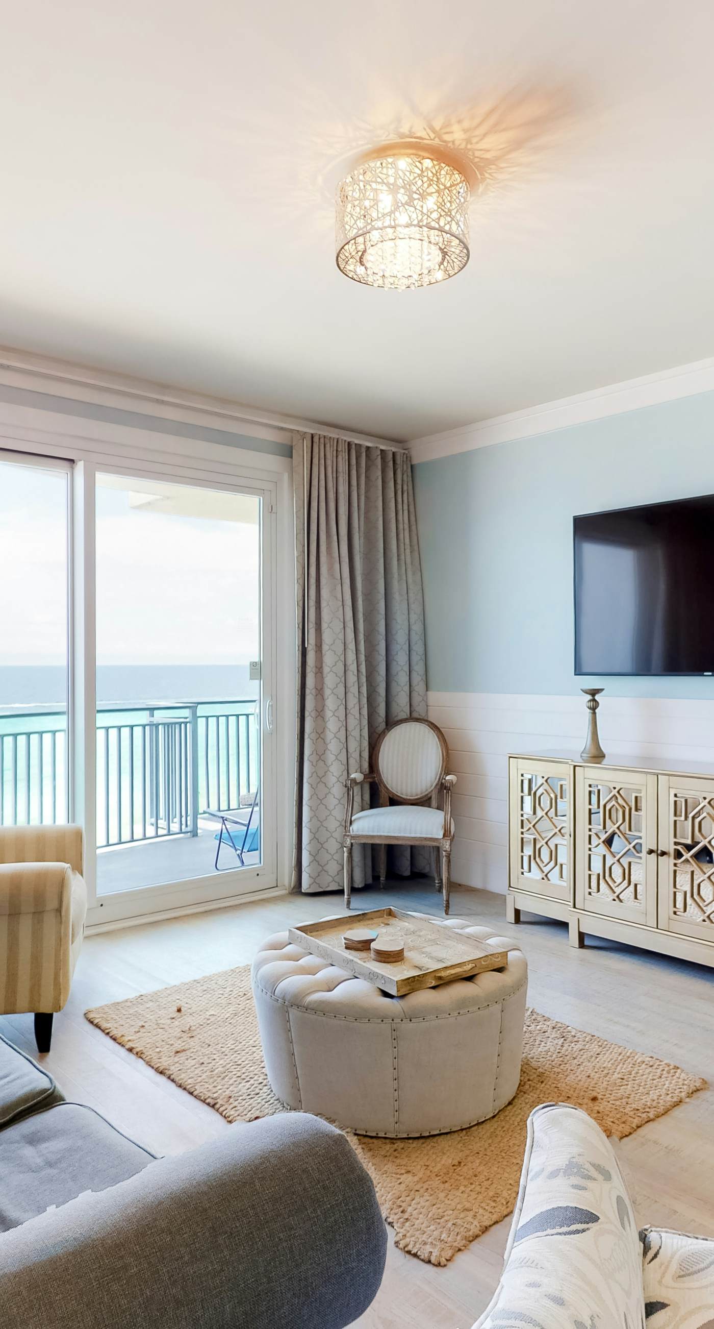 Beachfront condo with Gulf views, grill, balcony, outdoor pool, gym & hot tub