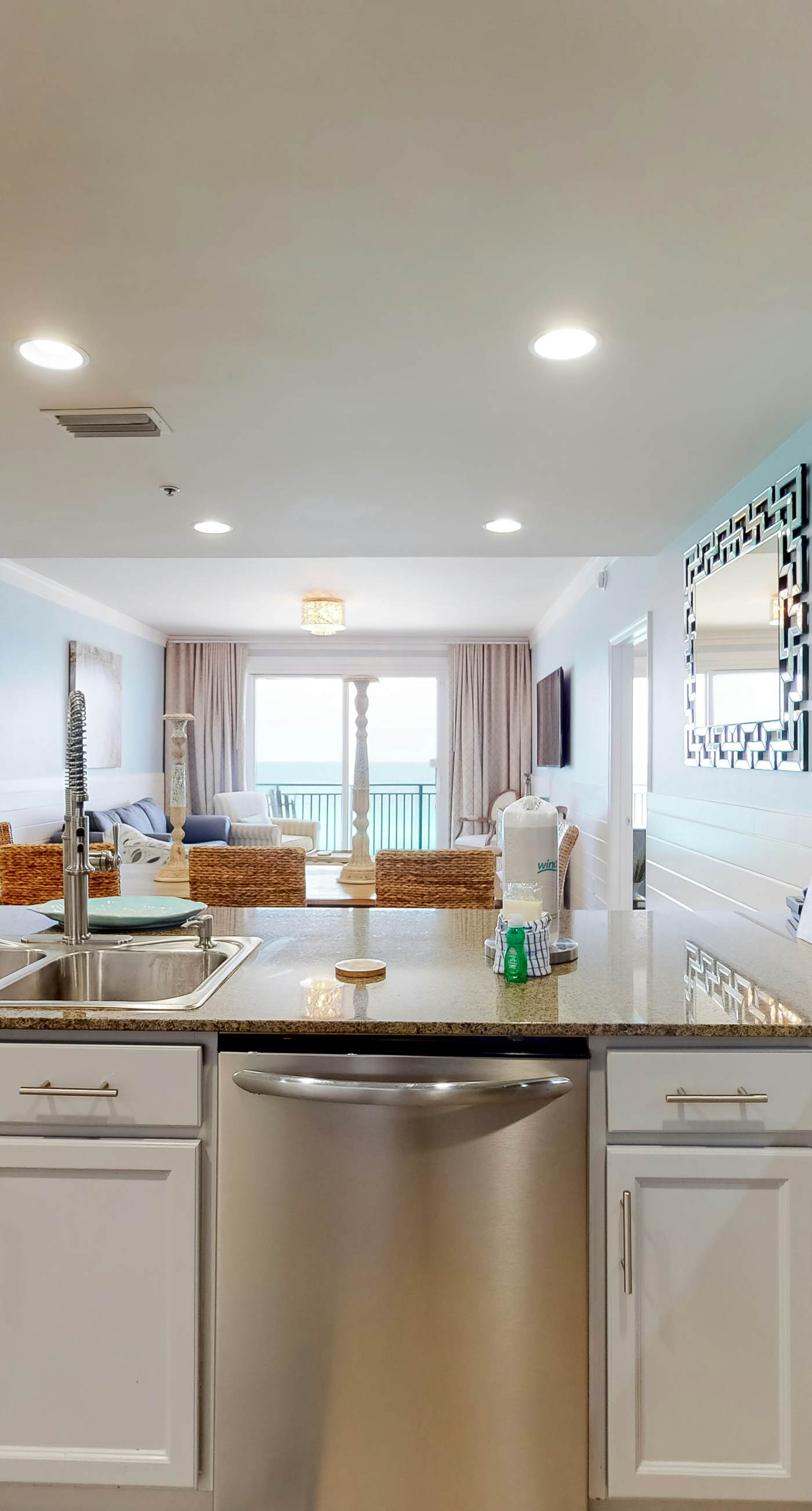 Beachfront condo with Gulf views, grill, balcony, outdoor pool, gym & hot tub