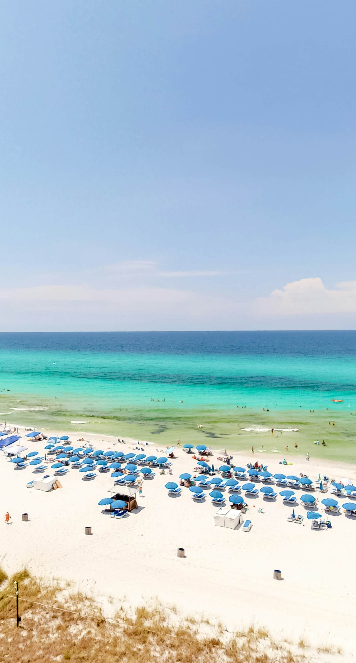 Beachfront condo with Gulf views, grill, balcony, outdoor pool, gym & hot tub