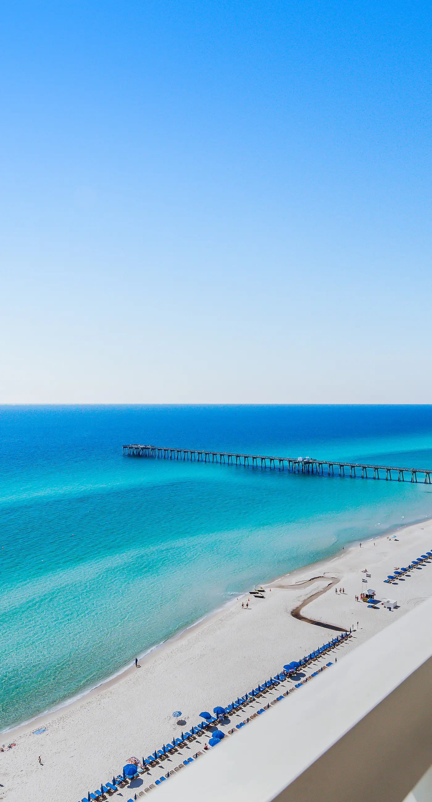 Renovated beachfront condo with balcony & pool