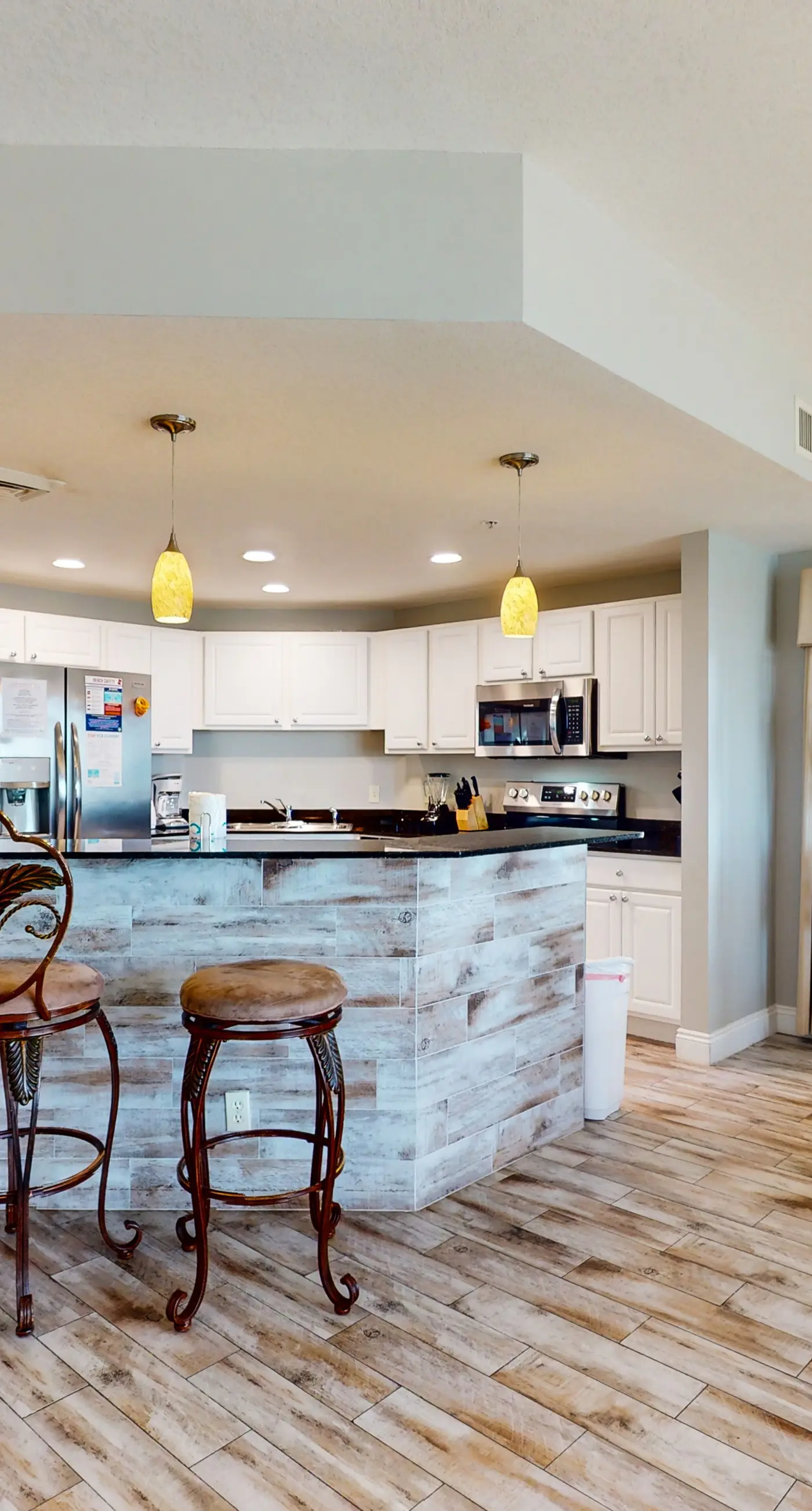 Beach-view, high-rise condo with pool - central location