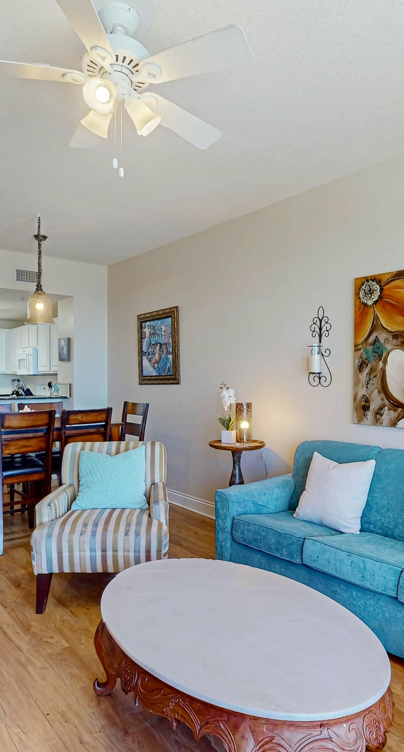 Tropical touches abound with balcony, pools, gym & beach access