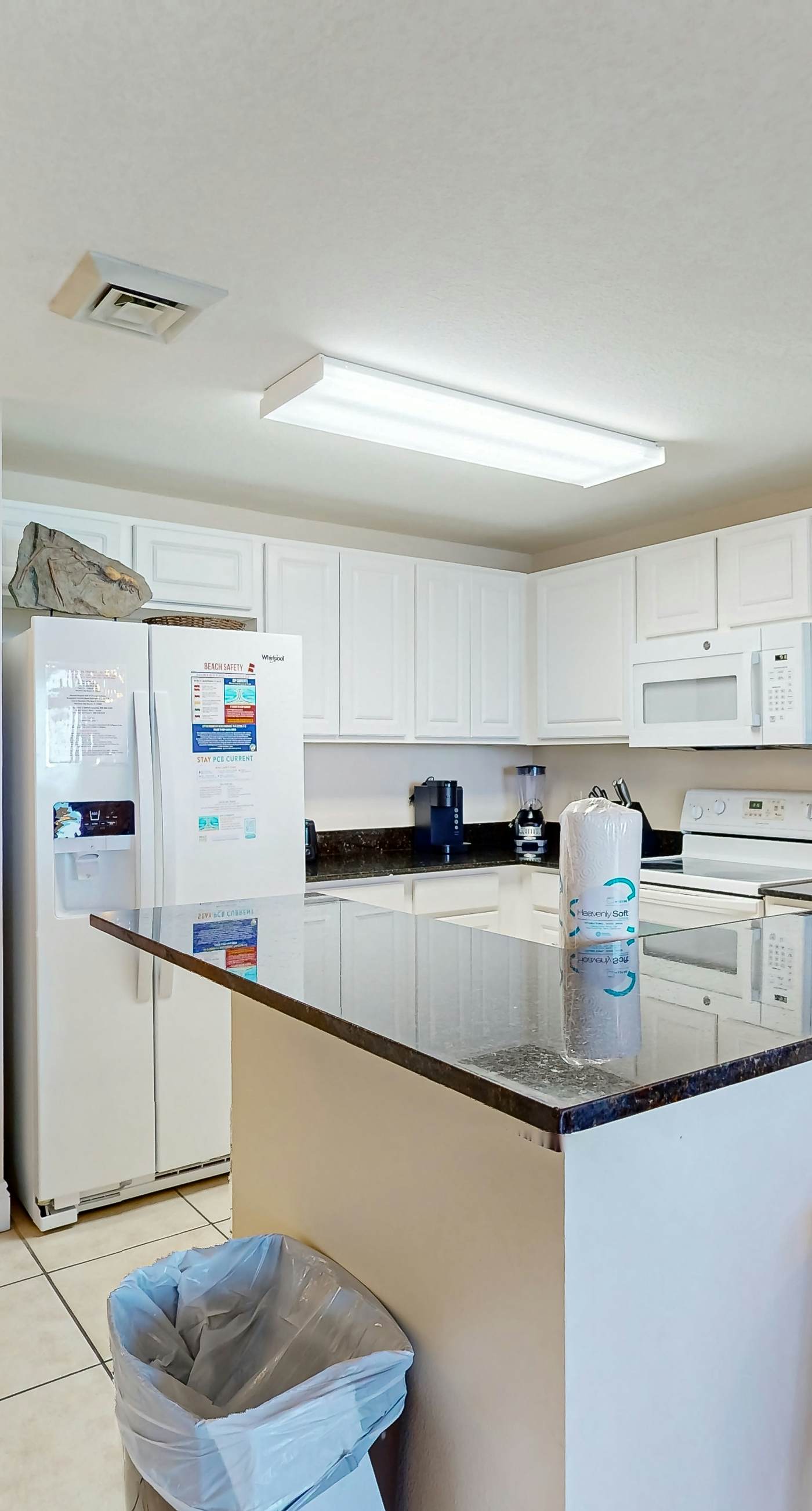 Tropical touches abound with balcony, pools, gym & beach access