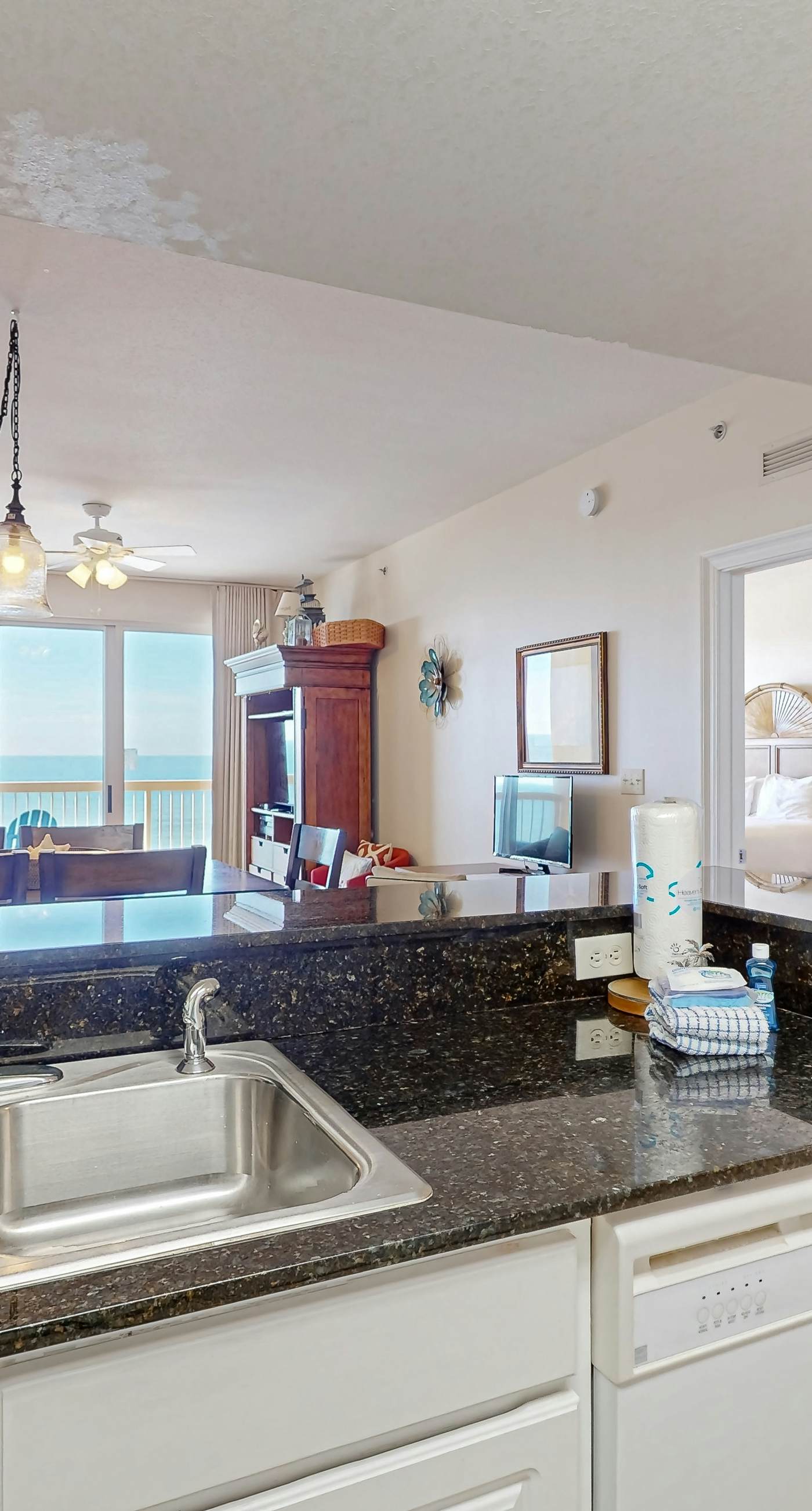 Tropical touches abound with balcony, pools, gym & beach access