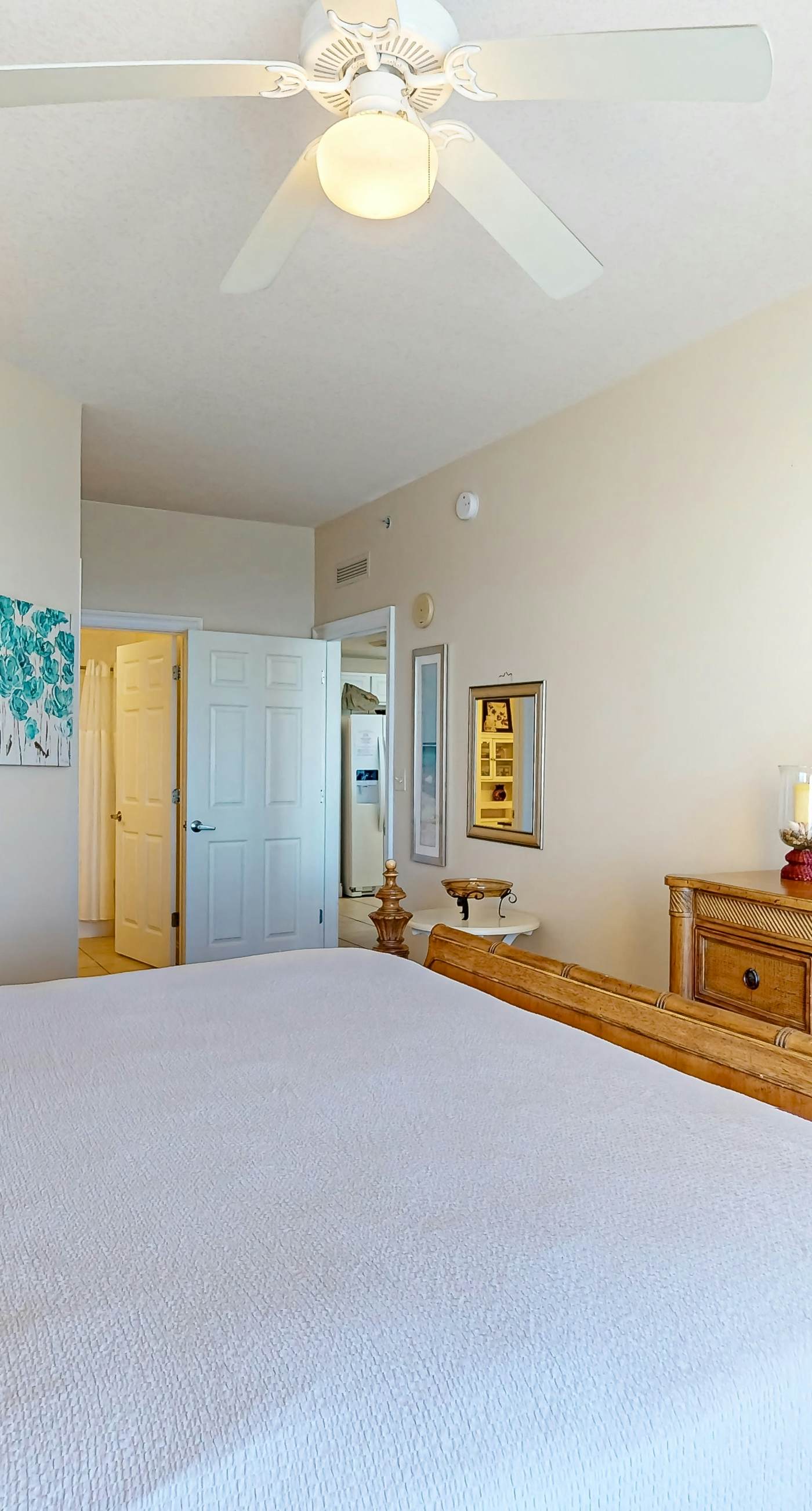 Tropical touches abound with balcony, pools, gym & beach access