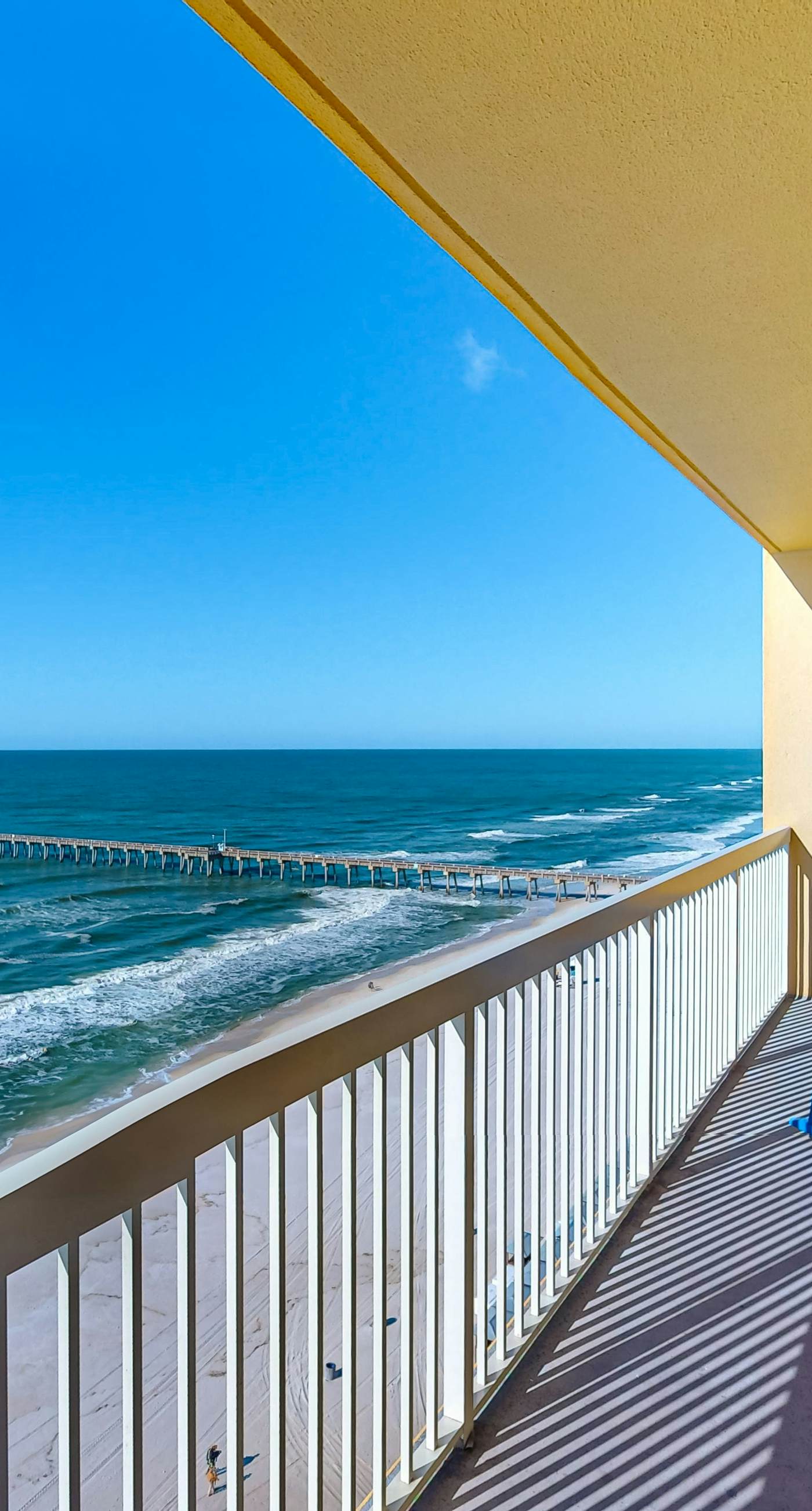 Tropical touches abound with balcony, pools, gym & beach access