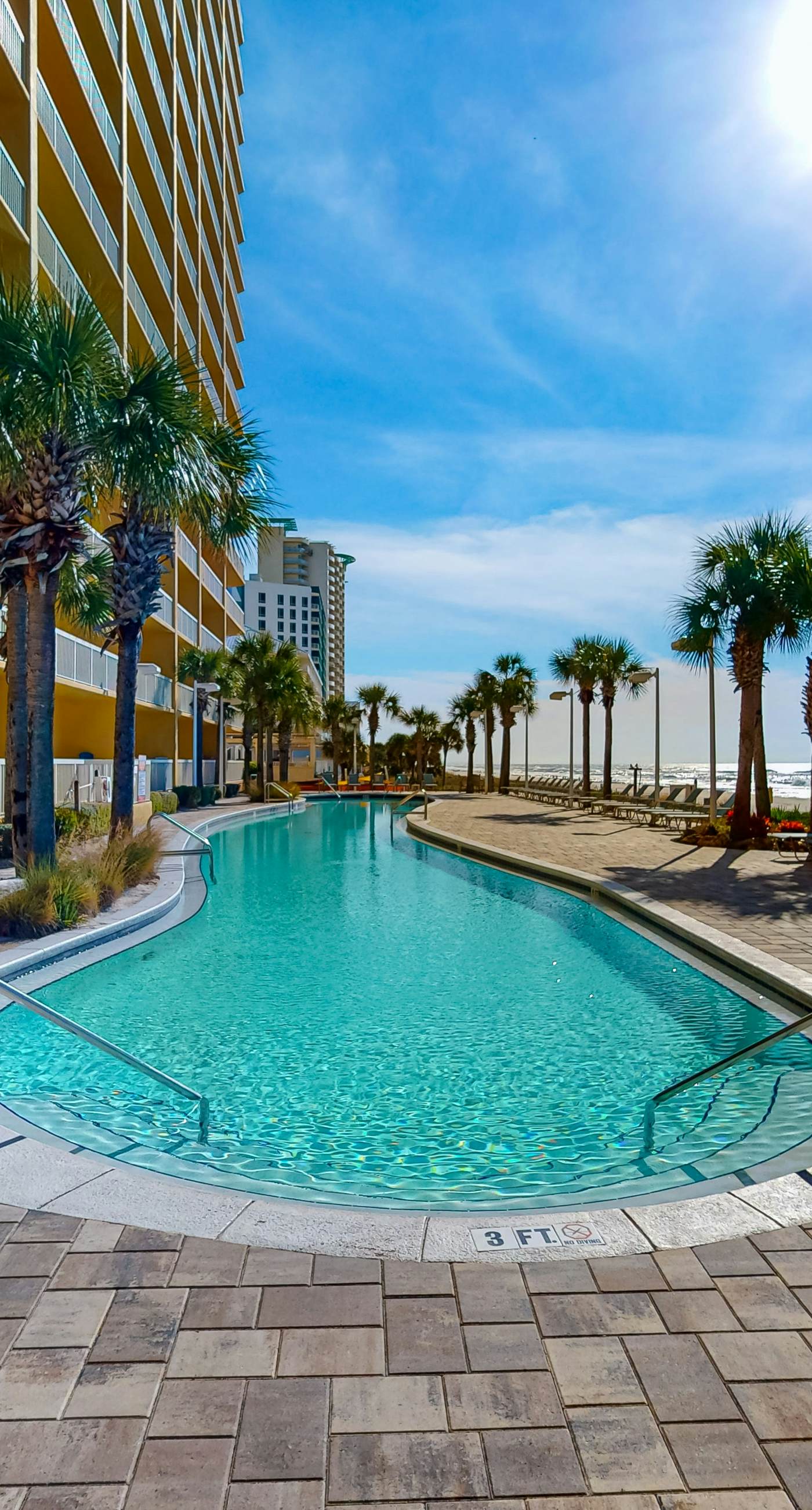 Tropical touches abound with balcony, pools, gym & beach access