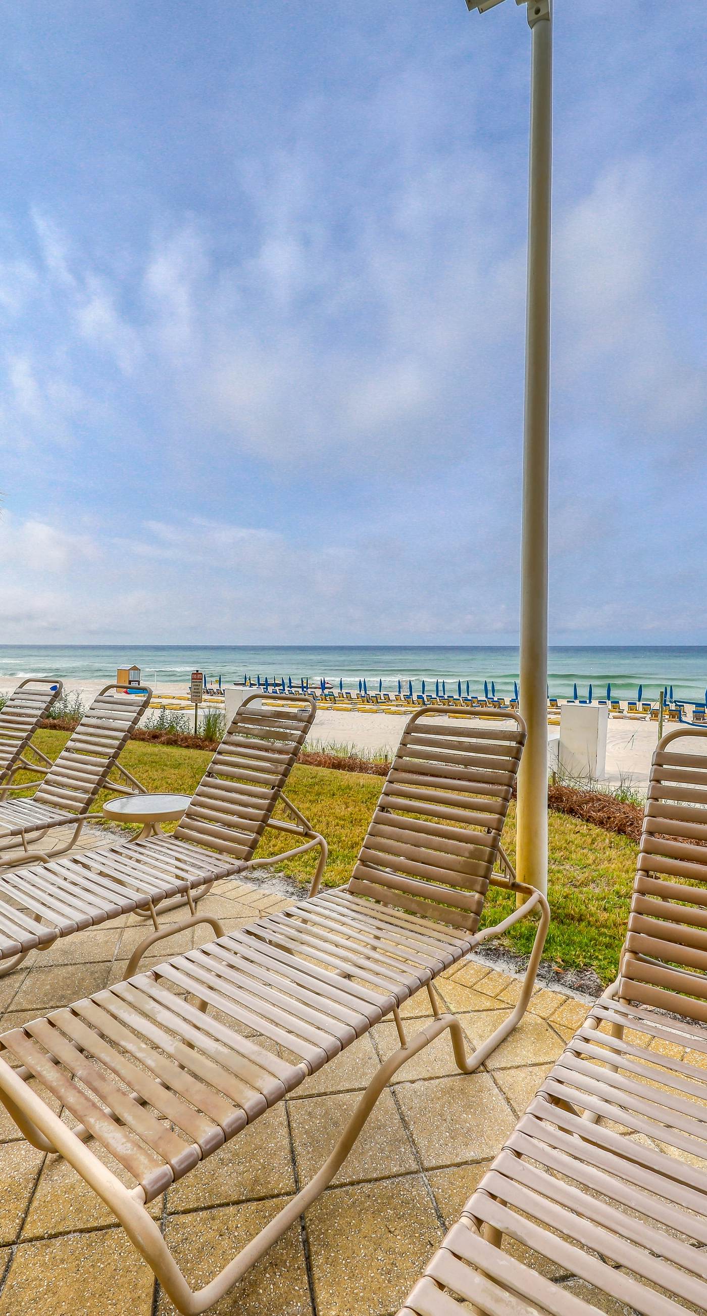 Tropical touches abound with balcony, pools, gym & beach access