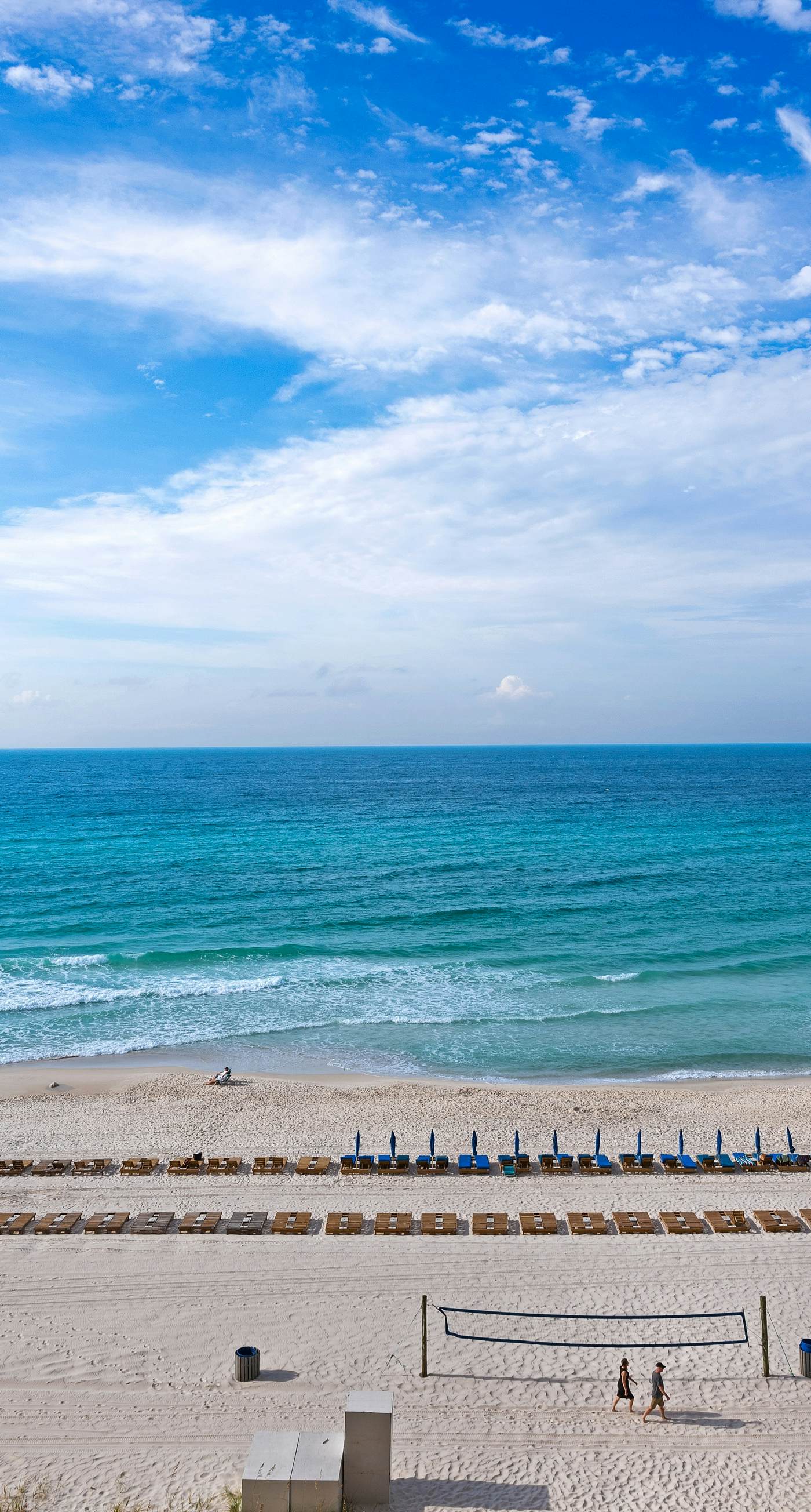 Tropical touches abound with balcony, pools, gym & beach access